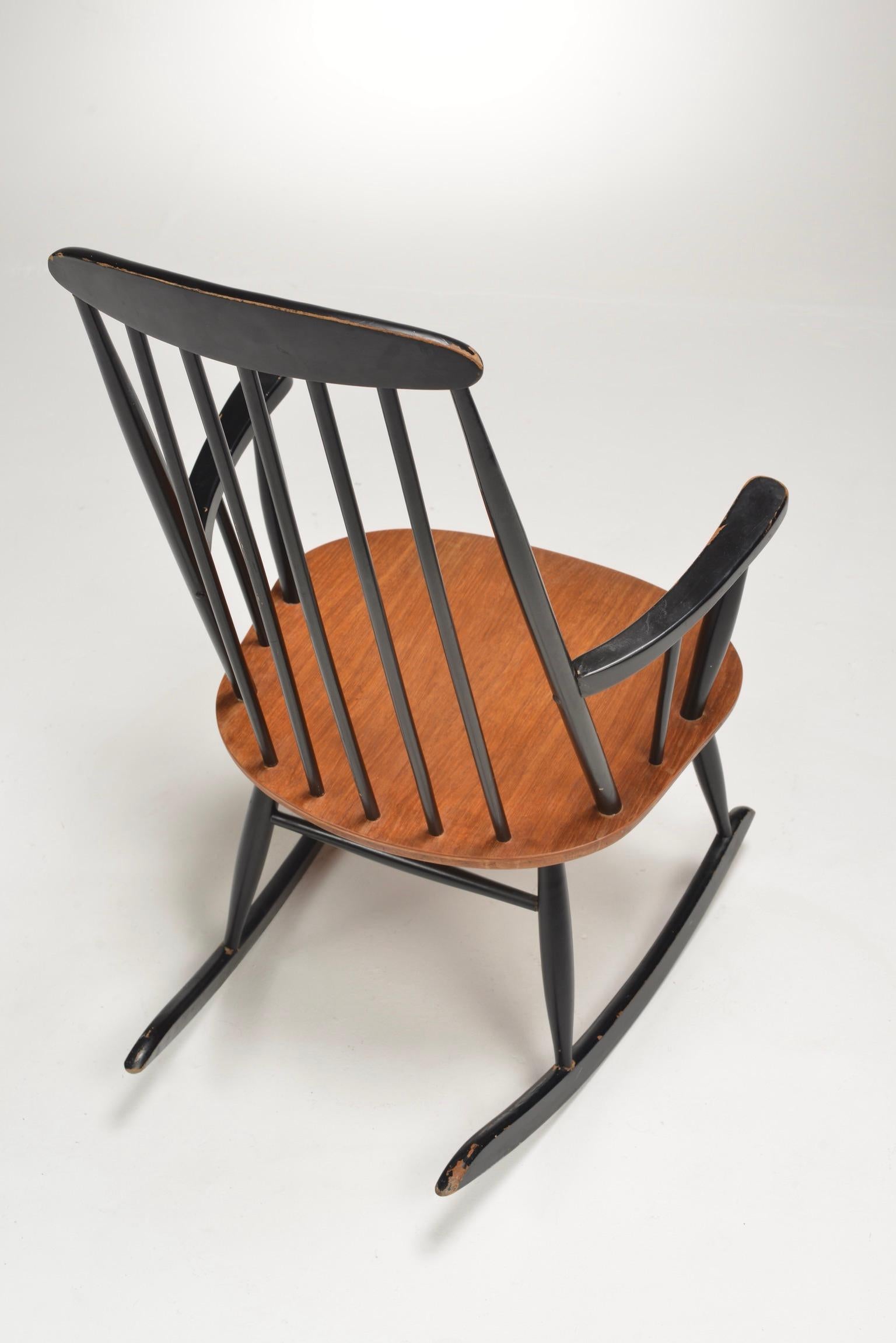 Danois Chaise longue à bascule en teck Roland Rainer en vente