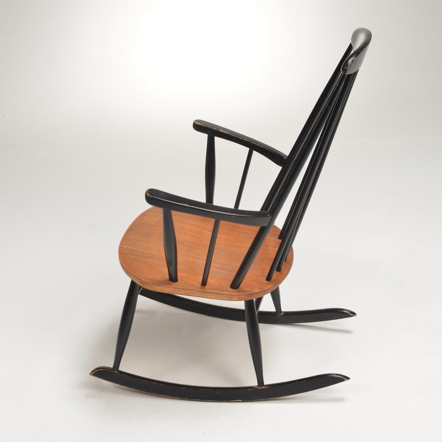 Teck Chaise longue à bascule en teck Roland Rainer en vente