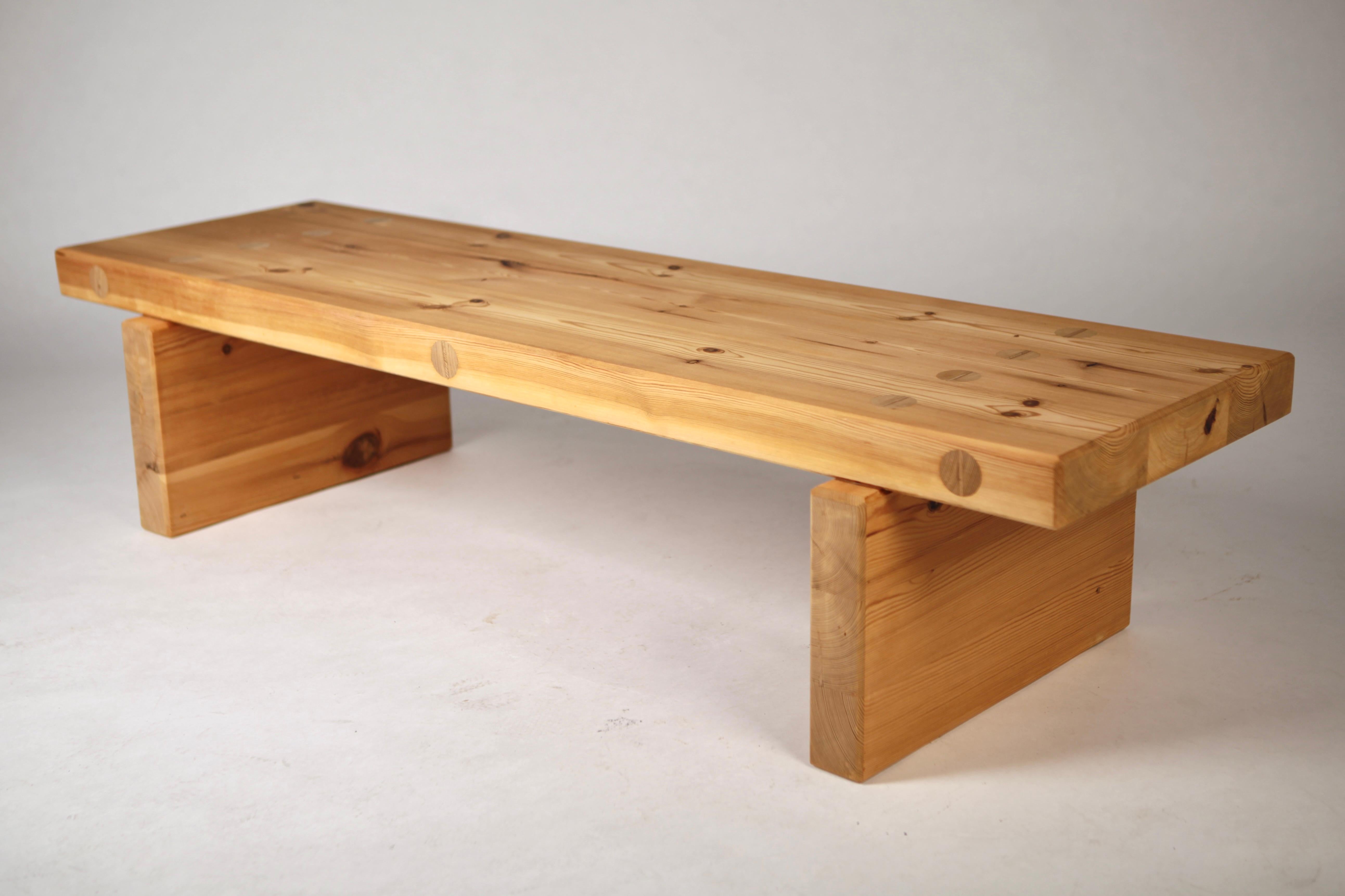 A timeless Scandinavian Modern bench or coffee table in solid thick pine by Roland Wilhelmsson, executed in Sweden, 1970.
Characteristic visible wood joints and great craftsmanship.
Signed to the underside.


