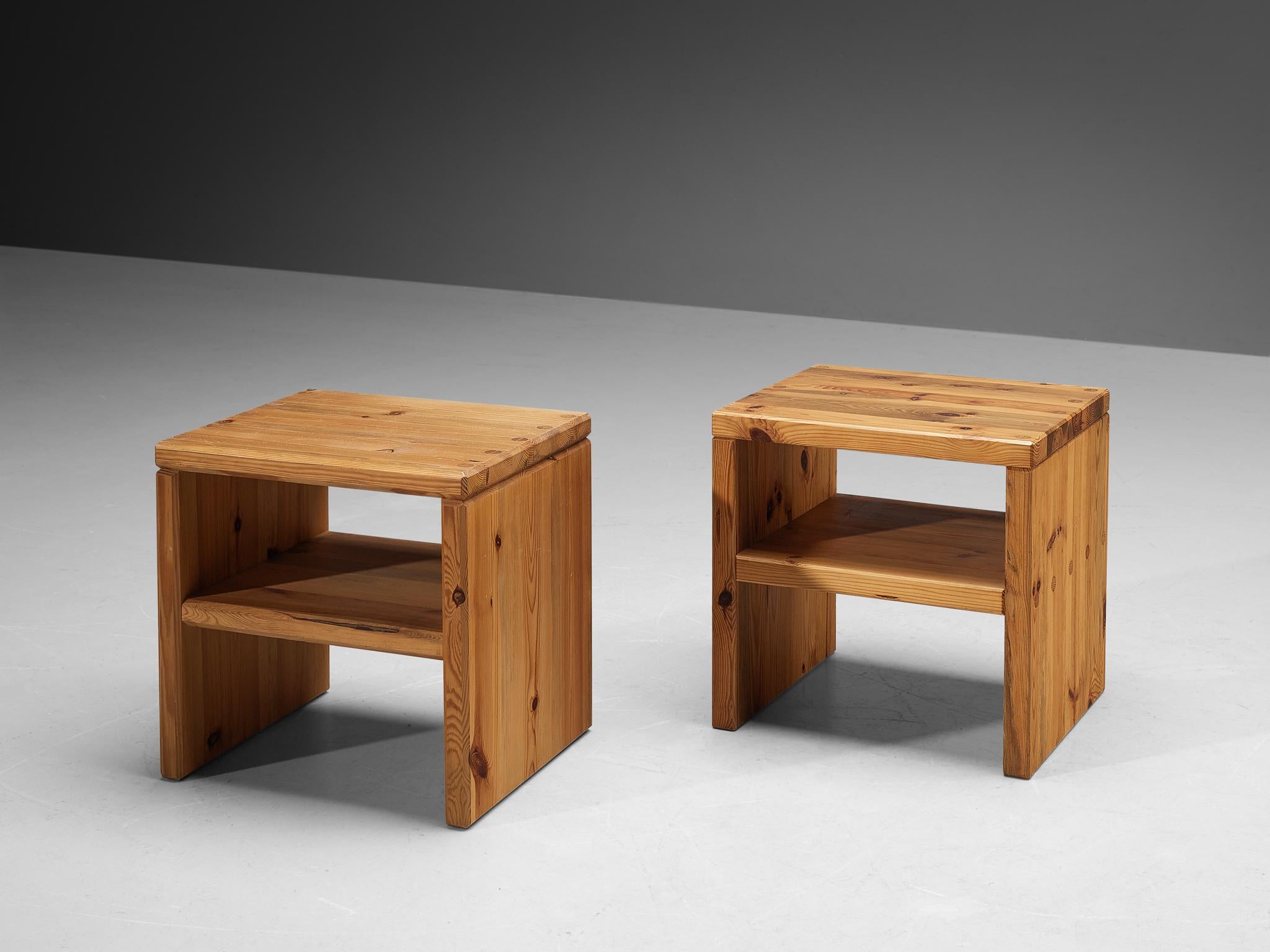 Roland Wilhelmsson for Karl Andersson & Söner, side tables, pine, Sweden, 1970s
 
This pair of side tables with a solid and sturdy look are constructed in a precise manner implementing straight lines, resulting in an eloquent and simplistic
