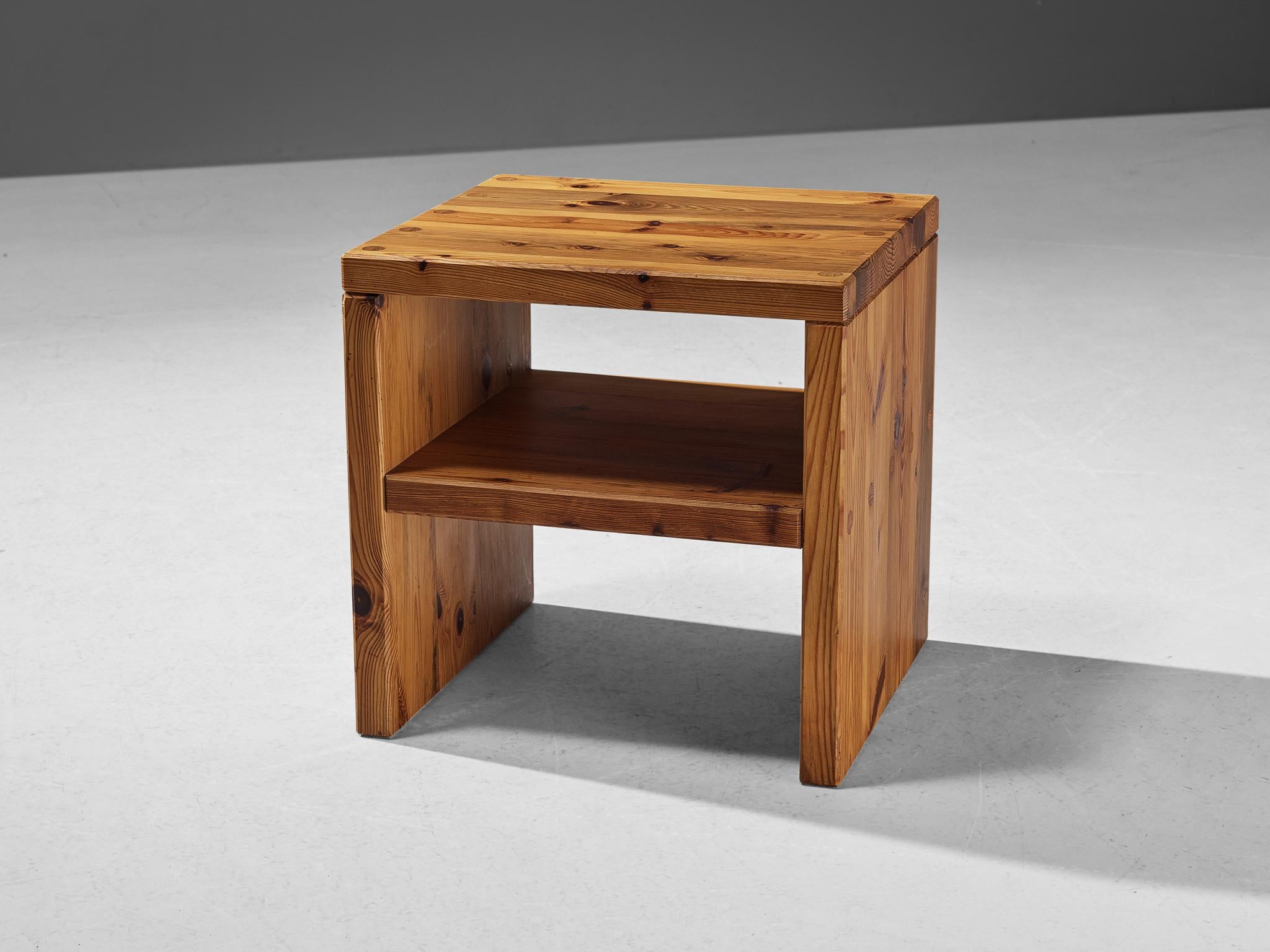 Roland Wilhelmsson for Karl Andersson & Söner, side table, pine, Sweden, 1970s
 
This side table with a solid and sturdy look is constructed in a precise manner implementing straight lines, resulting in a simplistic furniture piece that is typical