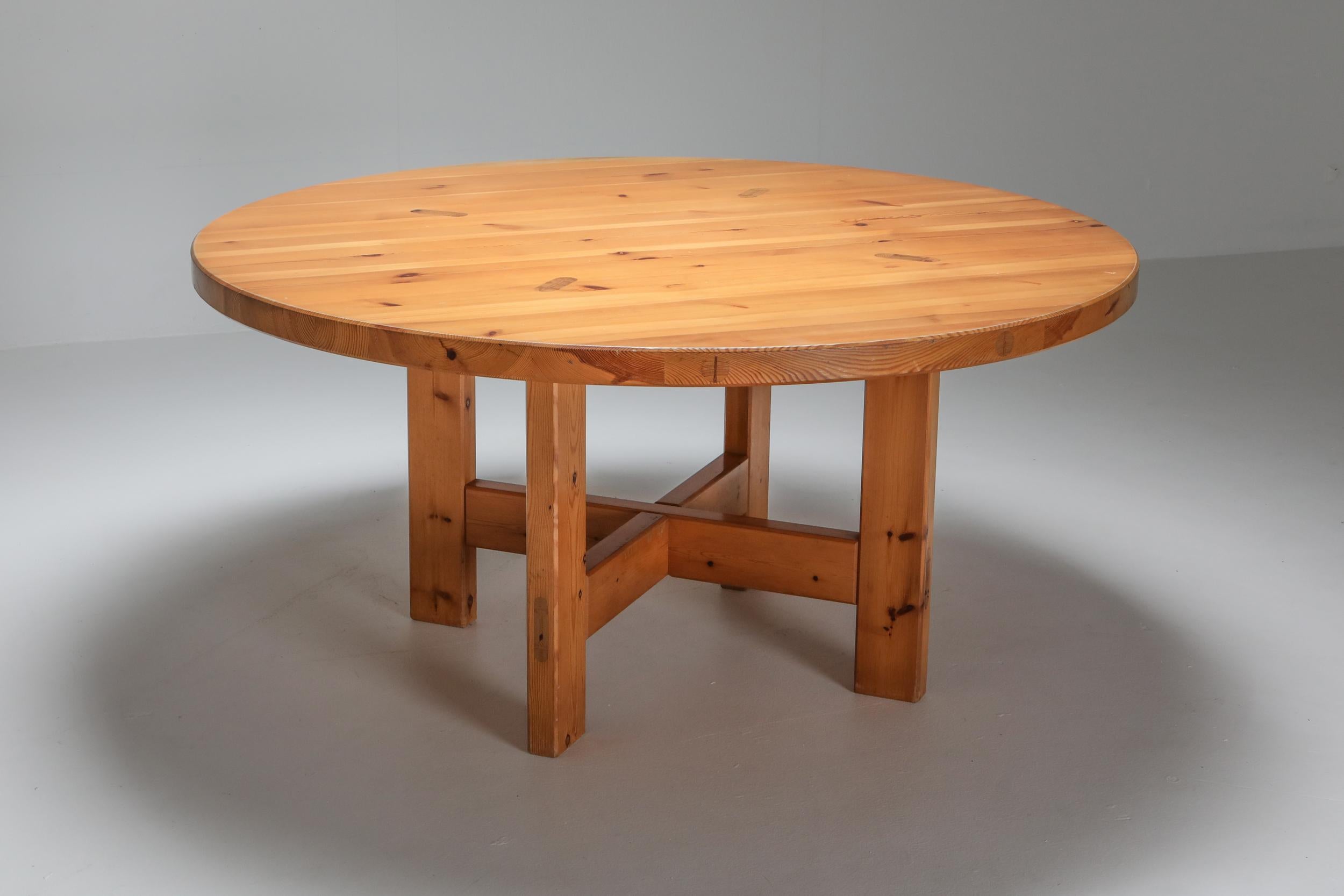 Roland Wilhelmsson; 1960s; Sweden

A Roland Wilhelmsson solid pine dining table for Karl Anderson & Söner, Sweden. The table is made of round top resting on four feet. The feet are fixed to the top with beautiful and expressive connections.