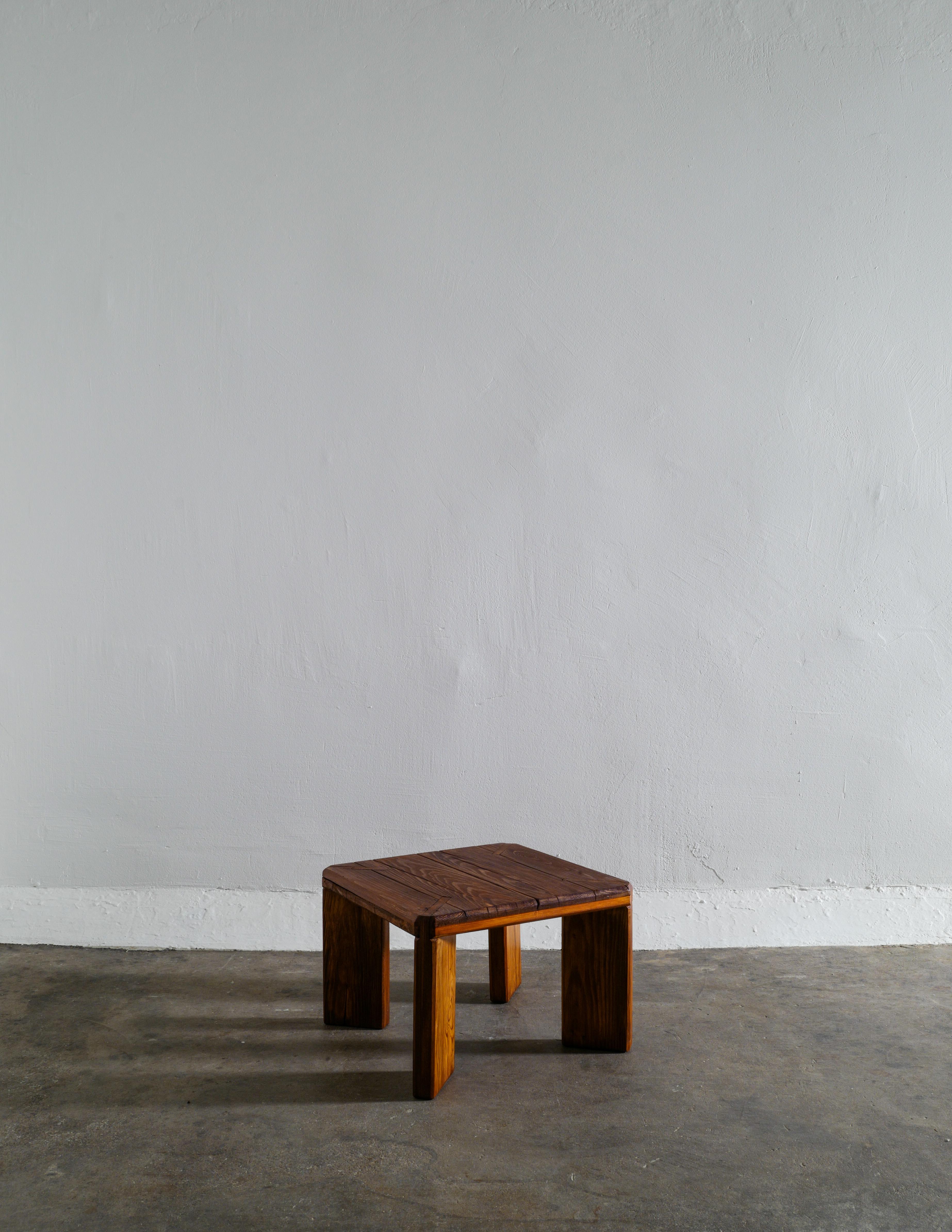 Rare stool or smaller side table by Roland Wilhelmsson made in the 1960s. In good vintage condition with some signs of use. Signed and dated.