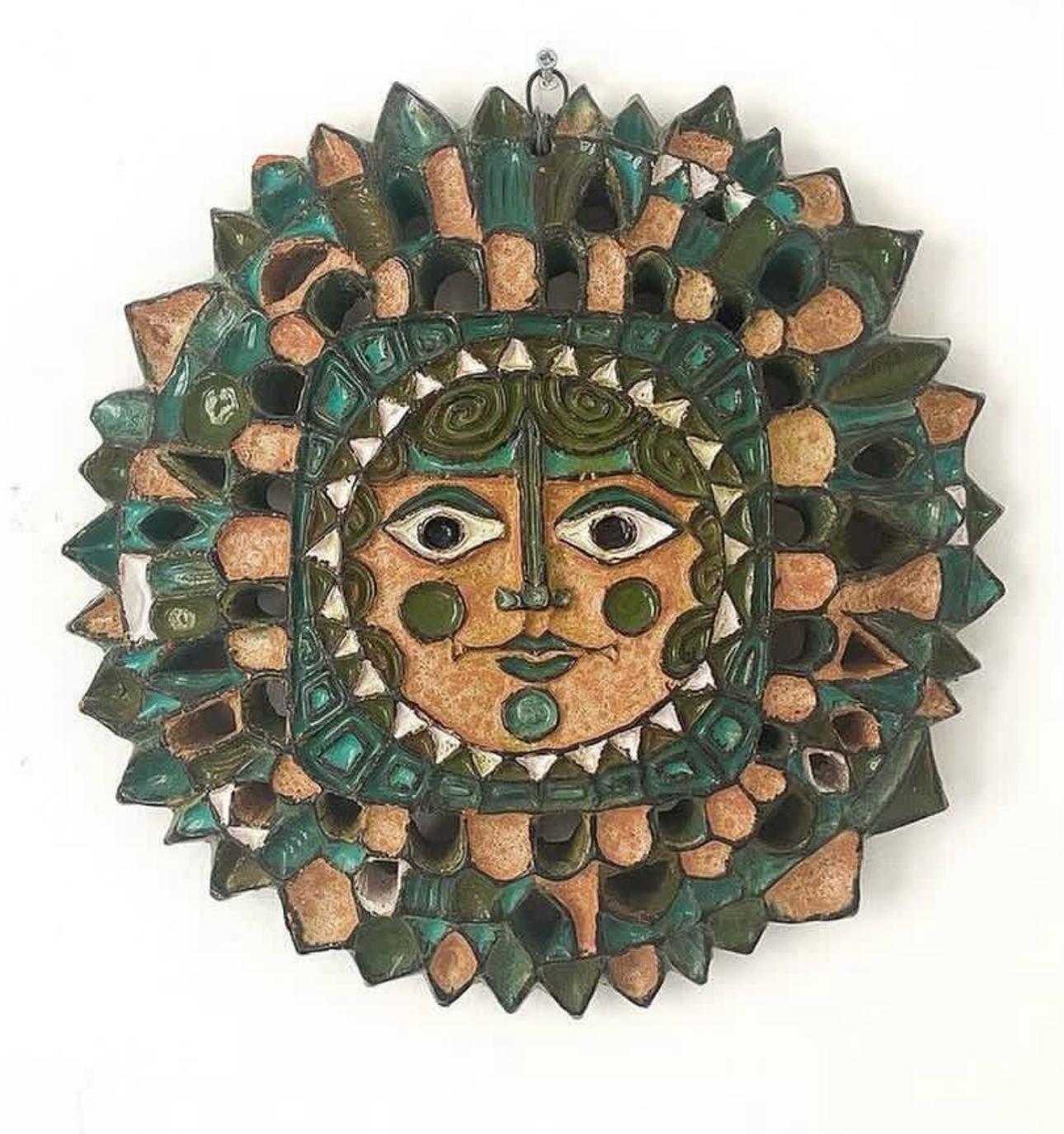 Roland Zobel Anduze France Les Cyclades Ceramic Sun Face with Polychromed Enamel Glaze, ca 1960s.

Extraordinary wall sculpture made of glazed ceramics in various shades of blue and brown by Roland Zobel (1915-2006), Les Cyclades workshop in Anduze,