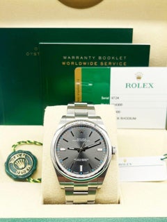 Rolex 114300 Oyster Perpetual Rhodium Dial 39mm Stainless Box Paper 2017