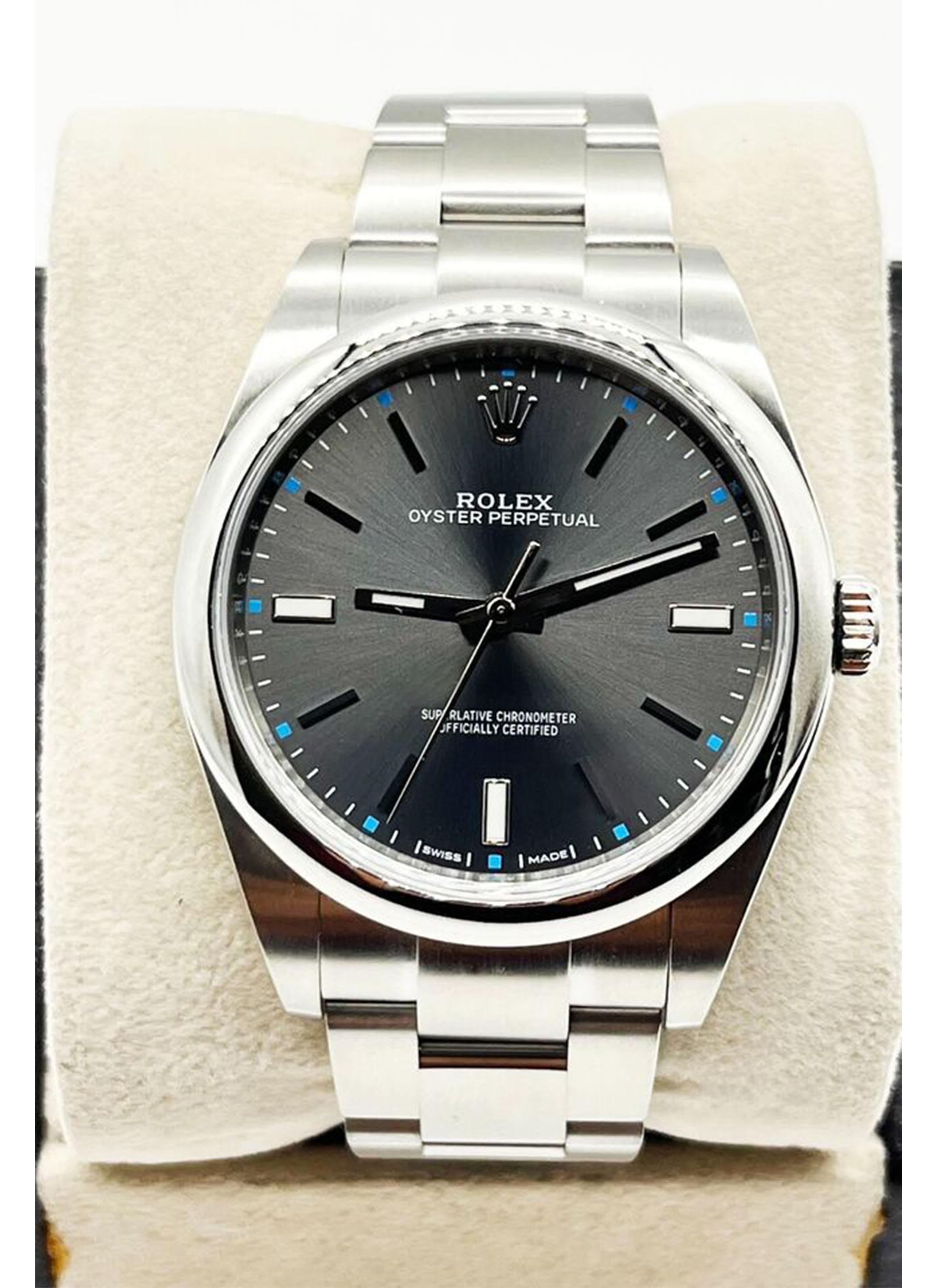 Rolex 114300 Oyster Perpetual Rhodium Dial 39mm Stainless Box Paper 2017 In Excellent Condition In San Diego, CA