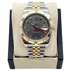 Rolex 116263 Datejust Turn o Graph, cadran argenté, or jaune 18 carats, boîte en acier et papier