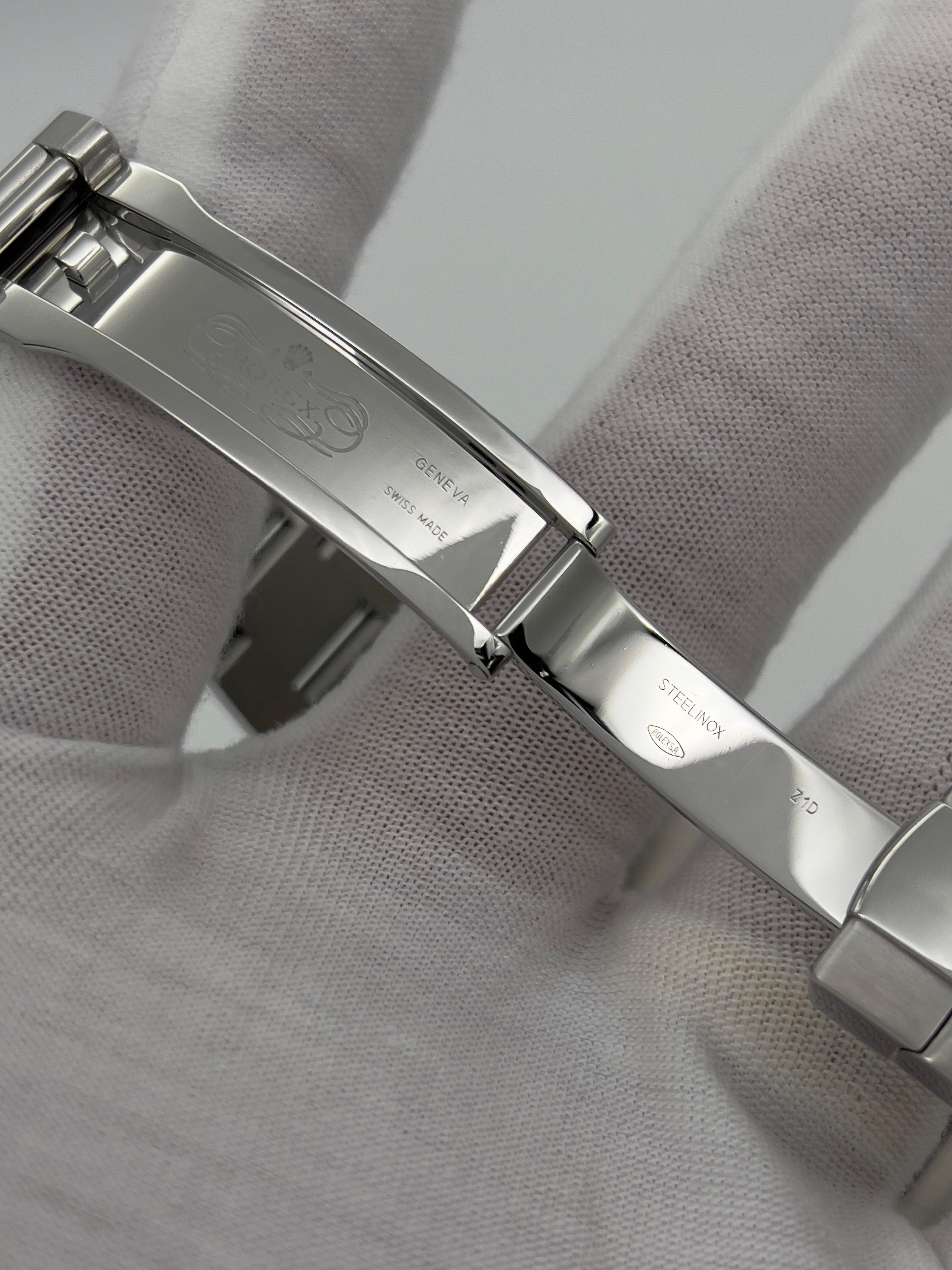 Rolex 116334 Datejust II, cadran romain bleu 41 mm, acier inoxydable, or 18 carats, boîte et papier 1