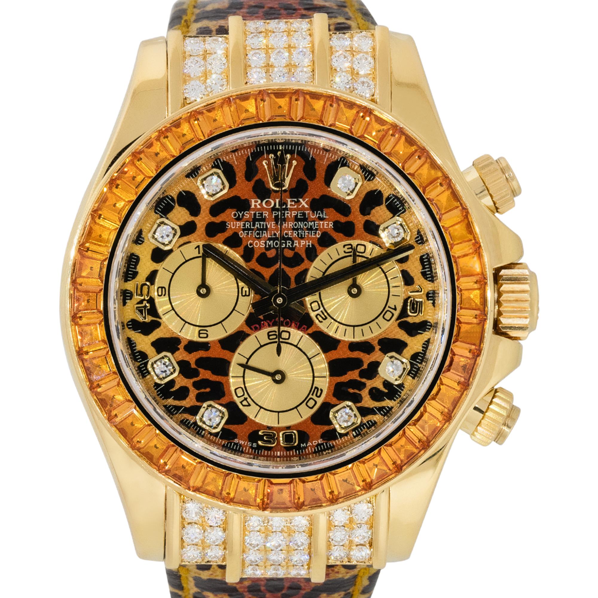 Brand: Rolex
MPN: 116598
Model: Daytona
Case Material: 18k Yellow gold with Diamonds
Case Diameter: 40mm
Crystal: Scratch resistant sapphire
Bezel: 18k yellow gold bezel with Orange sapphire gemstones
Dial: Leopard themed dial with yellow hold hands