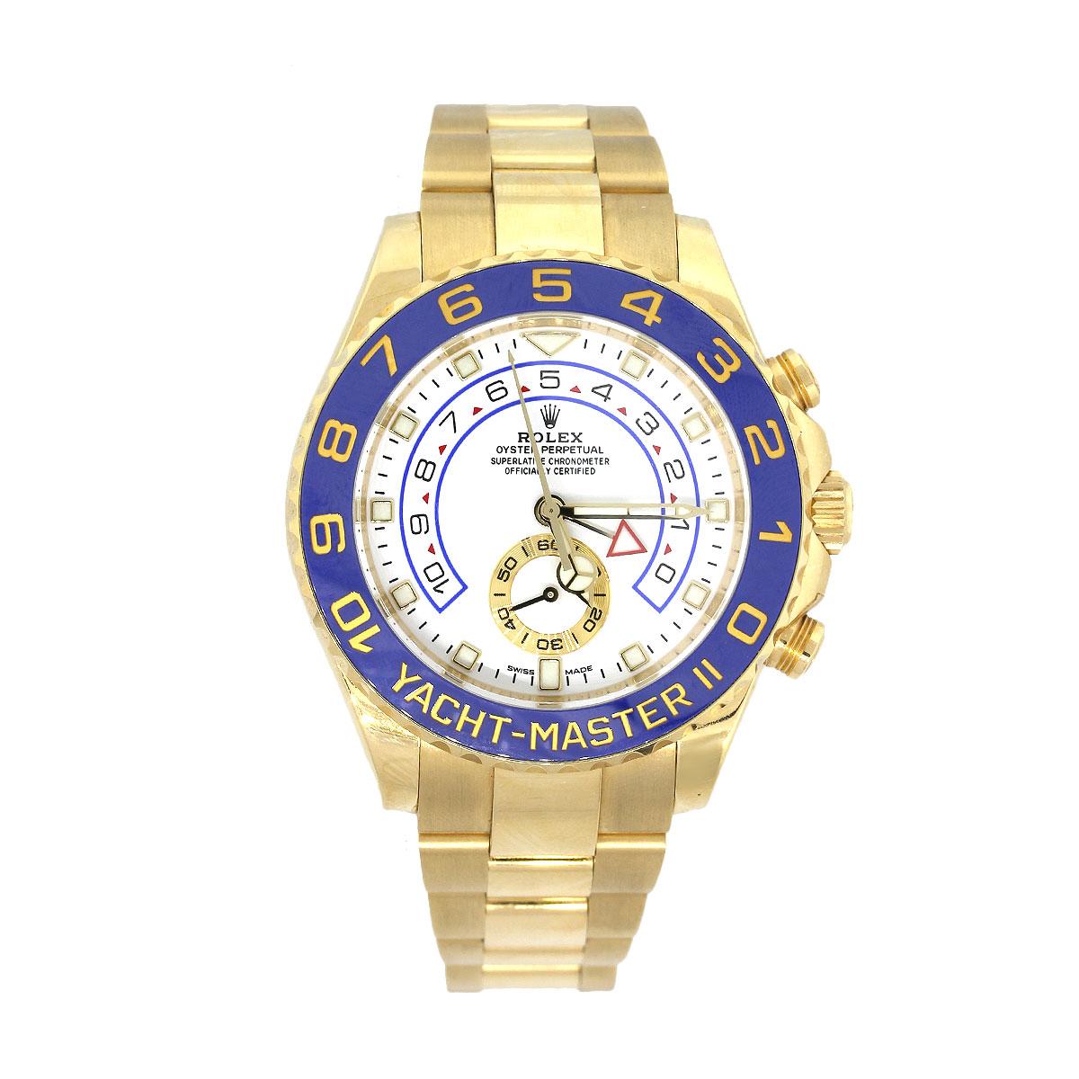 Brand: Rolex
MPN: 116688
Style: Yacht-Master II 18k Yellow Gold
Material: 18k Yellow Gold
Dial: White Dial with non-numeric luminescent markers and yellow gold mercedes hands.
Bezel: Bidirectional 18k yellow gold/blue bezel
Case Measurements: