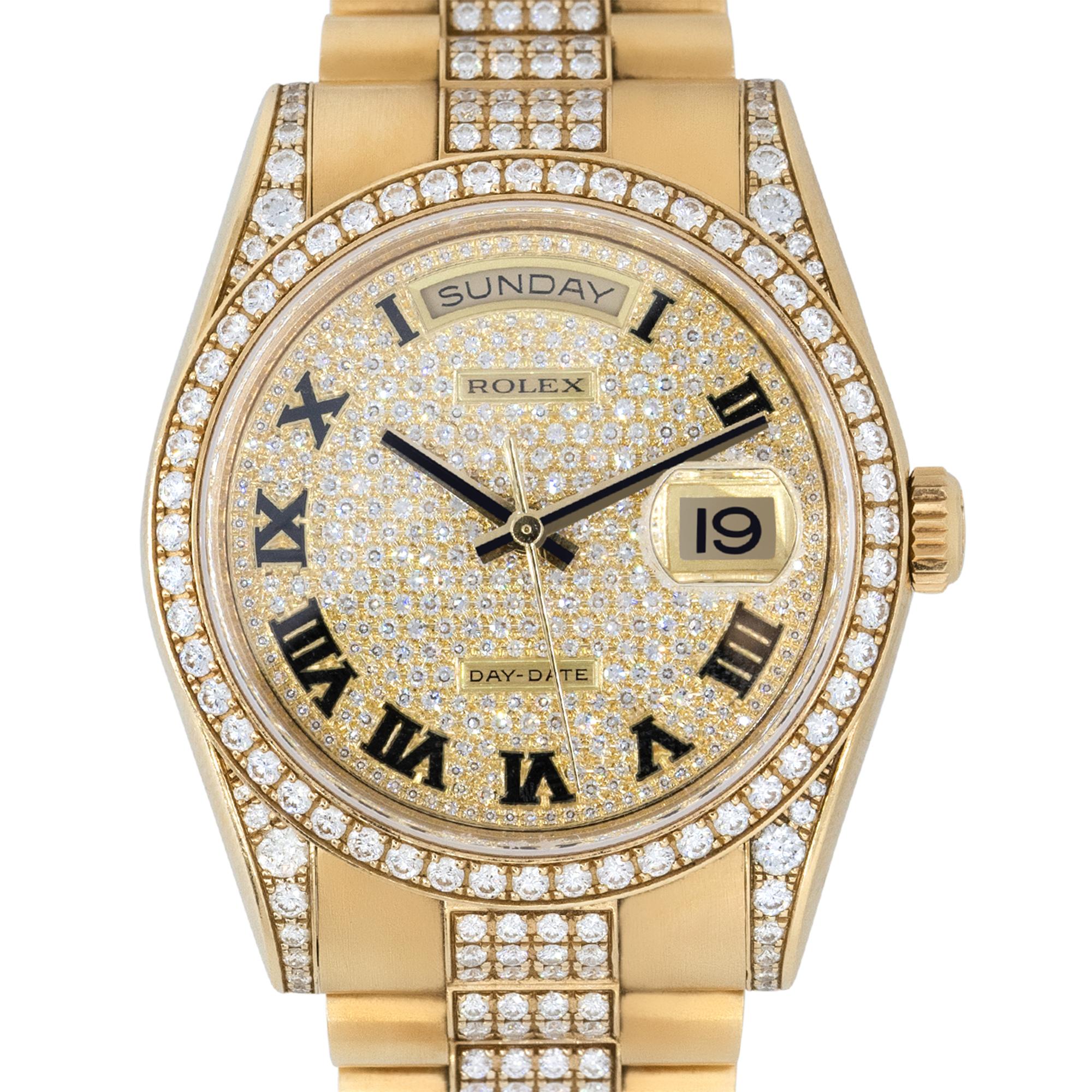 Brand: Rolex
Case Material: 18k Yellow Gold
Case Diameter: 36mm
Crystal: Sapphire Crystal
Bezel: 18k Yellow Gold bezel with Diamonds
Dial: All Diamond dial with black Roman numerals and yellow gold hands. Date can be found at 3 o'clock
Bracelet: 18k