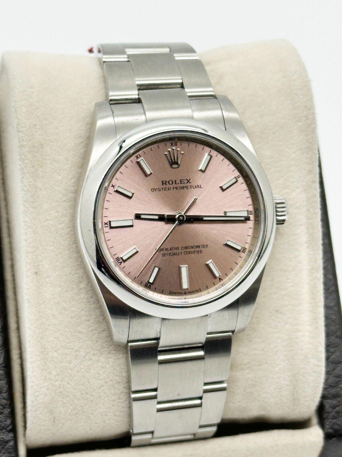 Rolex 124200 Oyster Perpetual Pink Zifferblatt 34mm Edelstahl Box Papier 2020 für Damen oder Herren