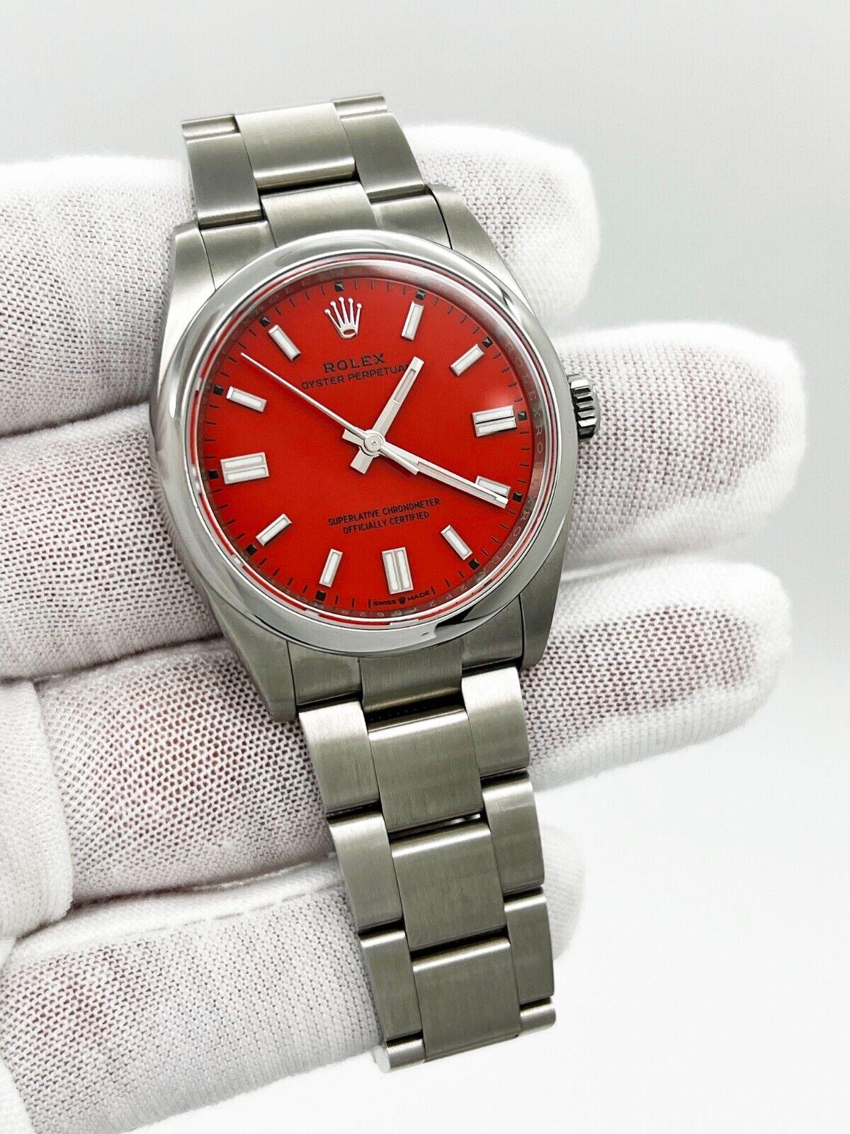 Style Number: 126000



Serial: 2P2Y5***



Year: 2022

 

Model: Oyster Perpetual 

 

Case Material: Stainless Steel 

 

Band: Stainless Steel 

 

Bezel: Stainless Steel 

 

Dial: Factory Original  Red Coral 

 

Face: Sapphire Crystal 

