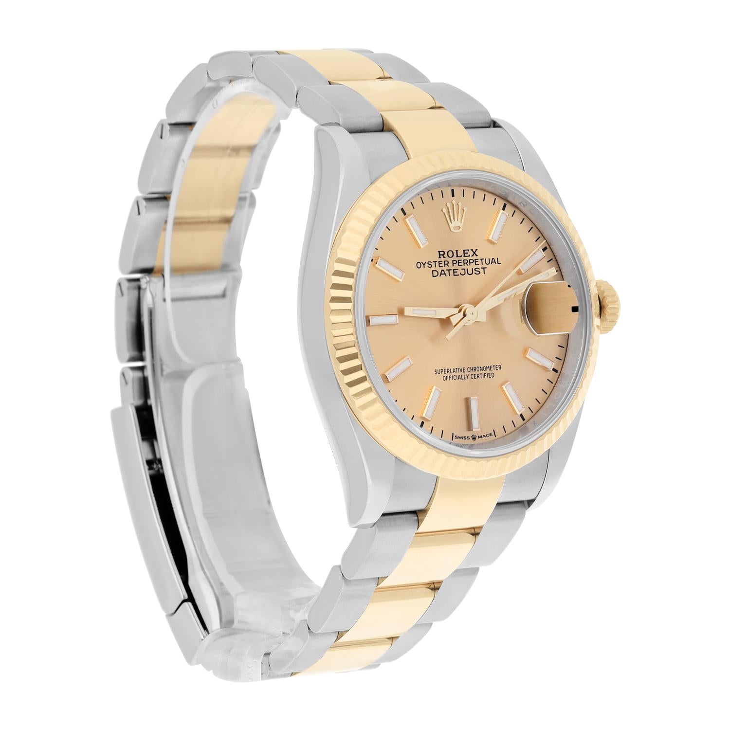 Rolex 126233 Datejust 36mm Two-Tone Yellow Gold Fluted Bezel Champagne Dial In Excellent Condition For Sale In New York, NY