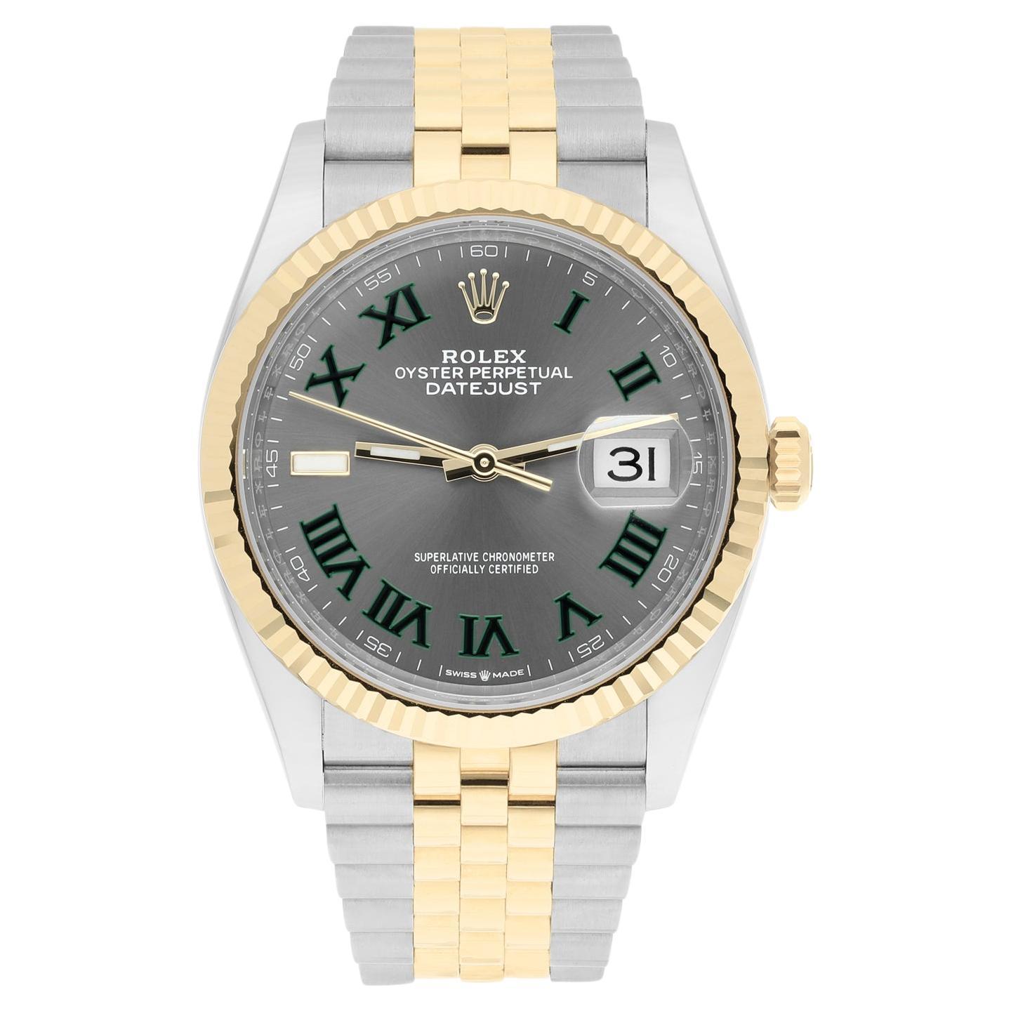 Discover timeless sophistication with the Rolex 126233 Datejust. This 36mm masterpiece features a stunning two-tone yellow gold design with a distinctive fluted bezel and an elegant Wimbledon dial.Never worn and accompanied by its original box and