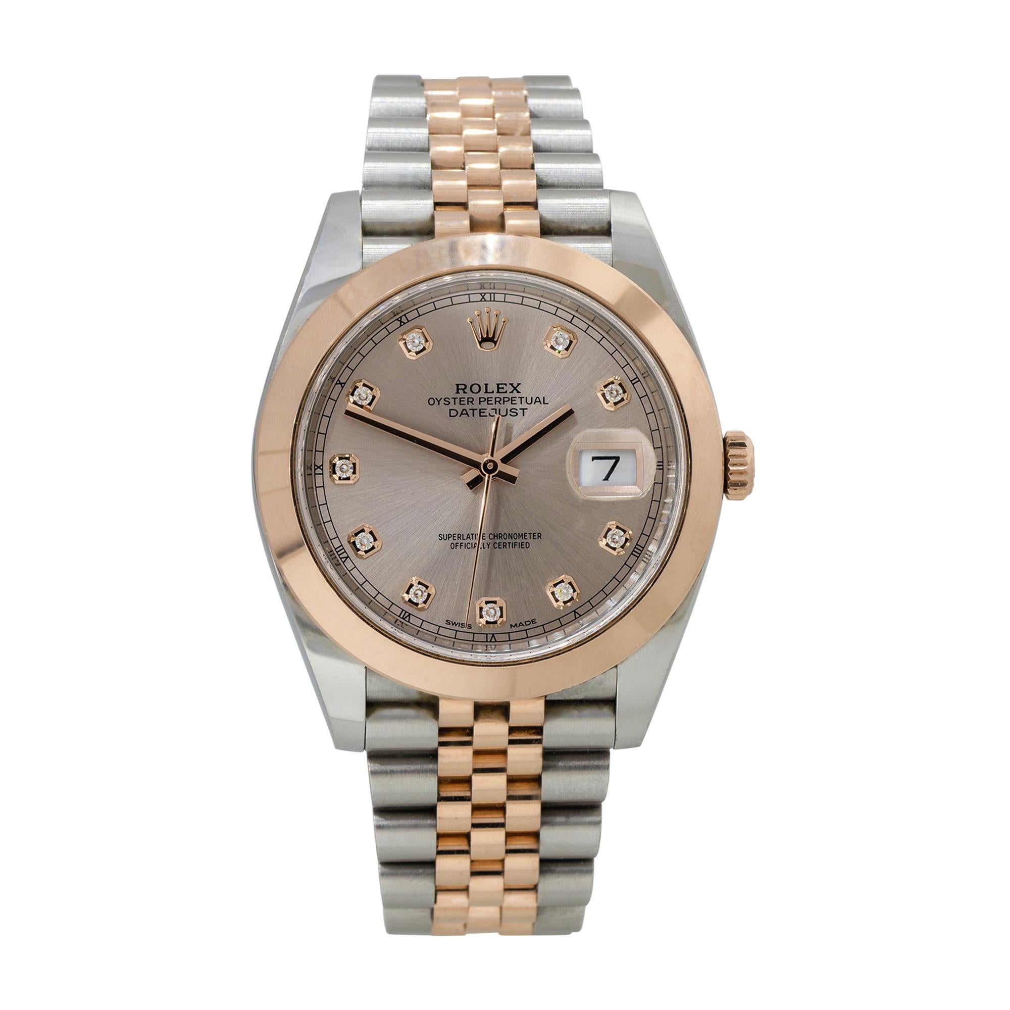 Brand: Rolex
MPN: 126301
Model: Datejust II
Case Material: Stainless steel
Case Diameter: 41mm
Crystal: Scratch resistant sapphire
Bezel: 18k rose gold smooth bezel
Dial: Rose tone dial with diamond dial markers, rose gold hands and date window at