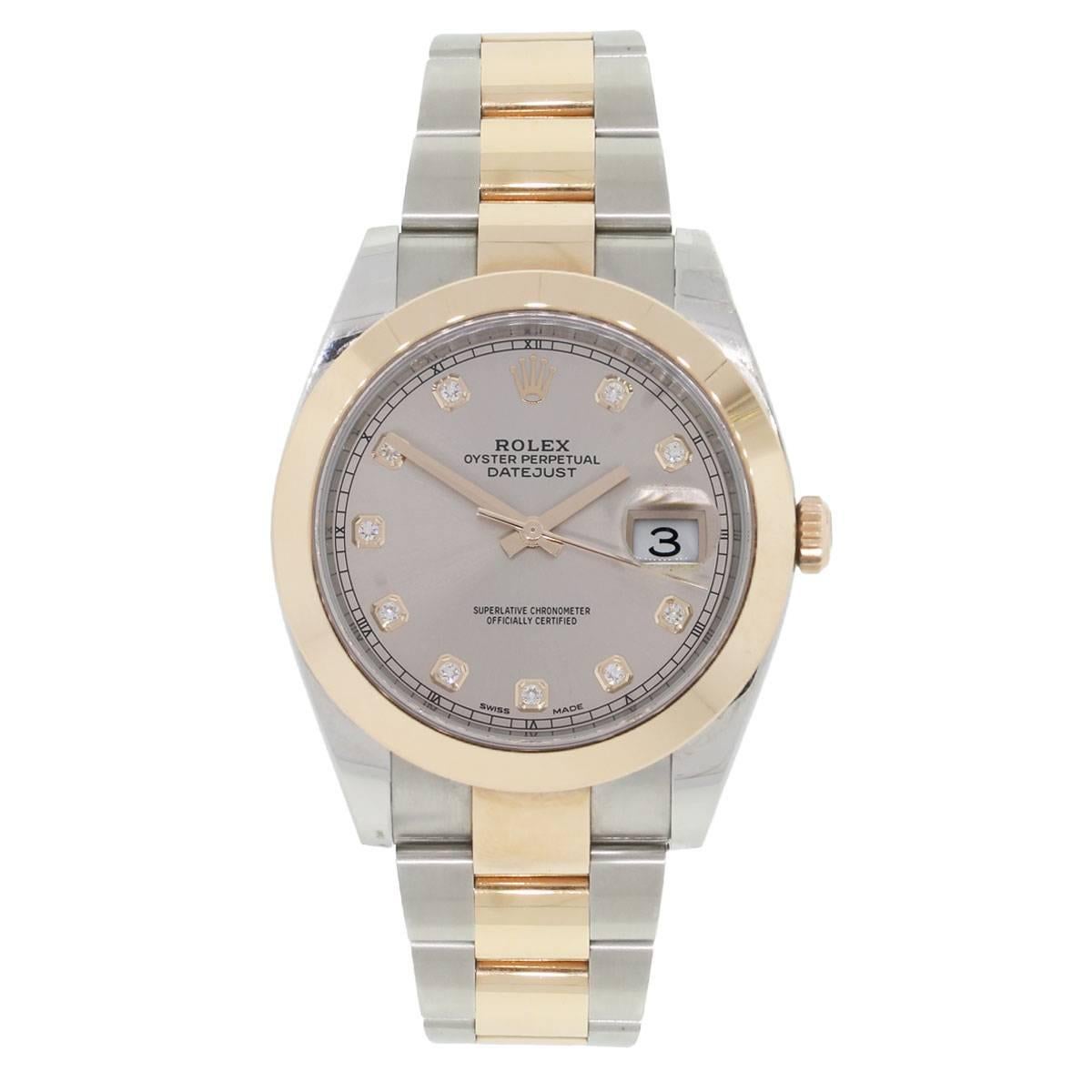 Brand: Rolex
MPN: 126301
Model: Datejust II
Case Material: Stainless steel
Case Diameter: 41mm
Crystal: Scratch resistant sapphire
Bezel: 18k rose gold smooth bezel
Dial: Rose tone dial with diamond dial markers, rose gold hands, date window at the