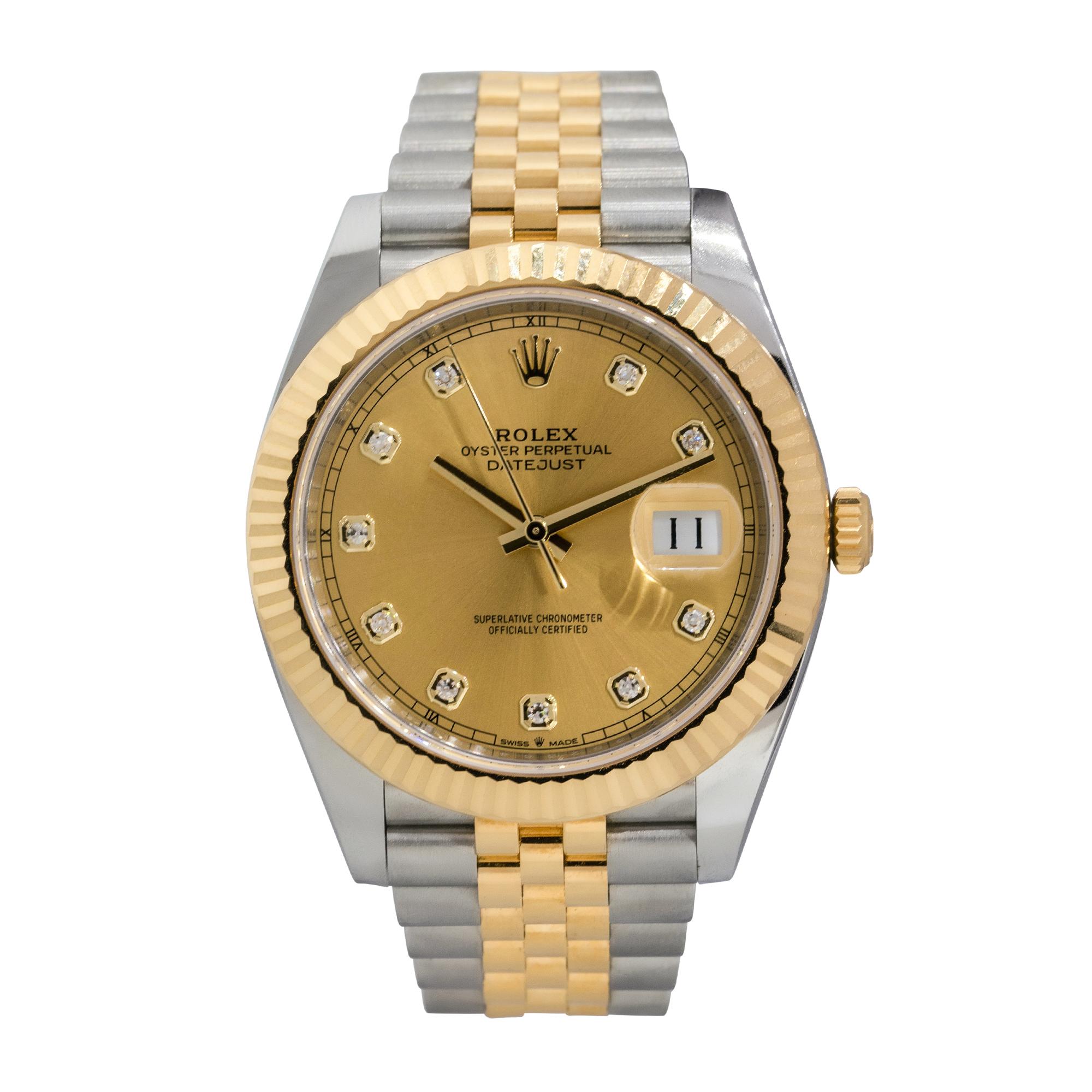 Brand: Rolex
MPN: 126333
Model: Datejust
Case Material: Stainless Steel
Case Diameter: 41mm
Crystal: Sapphire Crystal
Bezel: 18k Rose Gold Fluted Bezel
Dial: Factory champagne dial with Diamond numerals numerals. Date is displayed at 3 o'