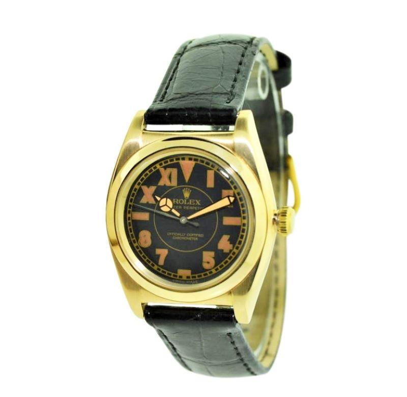 FACTORY / HOUSE: Rolex Watch Company
STYLE / REFERENCE: Bubbel back / Ref. 3131
METAL / MATERIAL: 14Kt. Yellow Gold
CIRCA: 1946 / 1947
DIMENSIONS: 39mm X 33mm
MOVEMENT / CALIBER: Perpetual Winding / 17 Jewels / Cal. N.A.
DIAL / HANDS: Black with