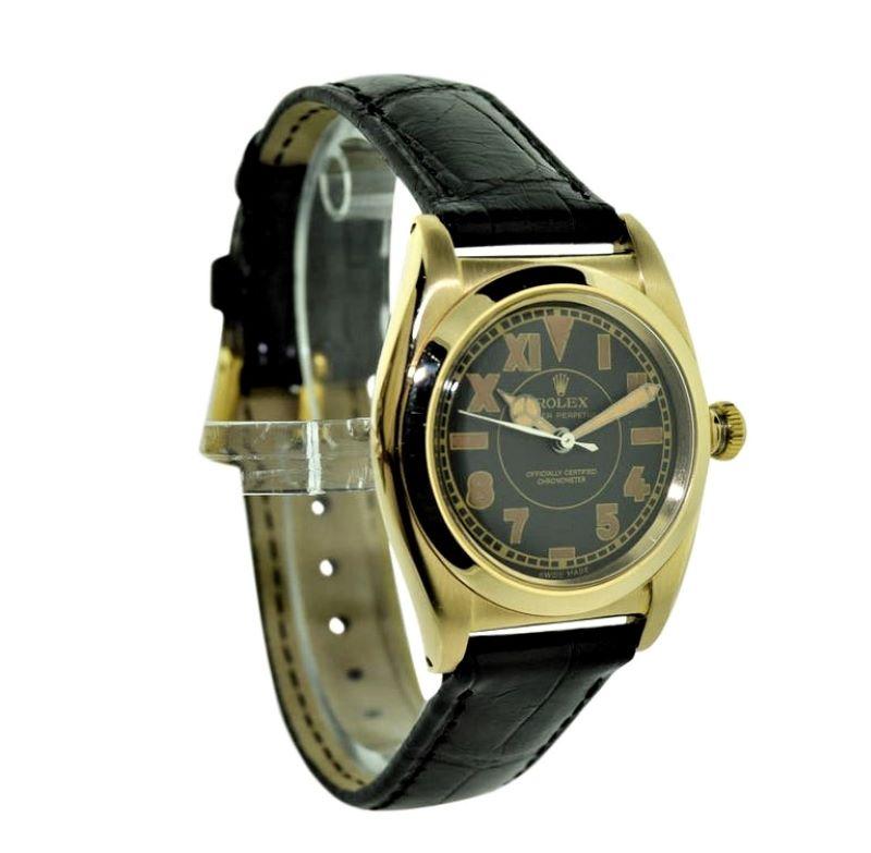 Rolex 14 Karat Gold Art Deco Bubble Back Wristwatch with Legendary Romabic Dial In Excellent Condition In Long Beach, CA