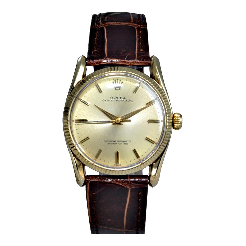 FACTORY / HOUSE: Rolex Watch Company
STYLE / REFERENCE: Oyster Perpetual / Ref. 1010
METAL / MATERIAL: 14Kt. Solid Yellow Gold
CIRCA: 1960's / 1970's
DIMENSIONS: 40mm X 33mm
MOVEMENT / CALIBER: Perpetual Winding / 26 Jewels / Cal. 1560
DIAL / HANDS: