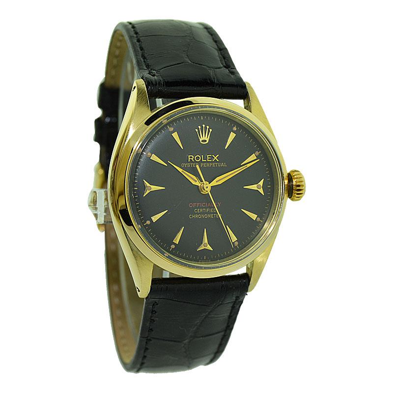 FACTORY / HOUSE: Rolex Watch Company
STYLE / REFERENCE: Oyster Perpetual / Ref. 6584
METAL / MATERIAL: 14kt Solid Gold
CIRCA / YEAR: 1950's
DIMENSIONS / SIZE: 39mm X 34mm
MOVEMENT / CALIBER: Perpetual Winding / 26 Jewels / Cal. 1030  
DIAL / HANDS: