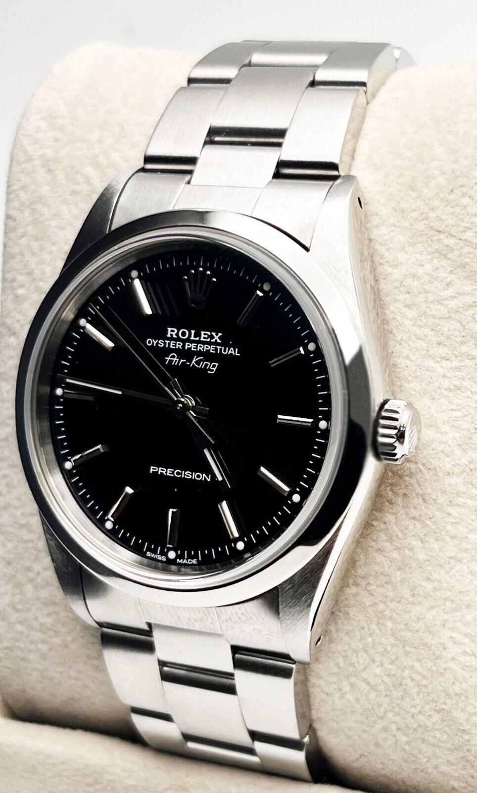 Numéro de style : 14000
Série : E750***
Année : 1991
Modèle : Air King
Matériau du boîtier : Acier inoxydable 
Bande : Acier inoxydable 
Lunette : Acier inoxydable 
Cadran : Noir
Visage : Cristal saphir 
Taille du boîtier : 34 mm
Comprend : 
-Rolex
