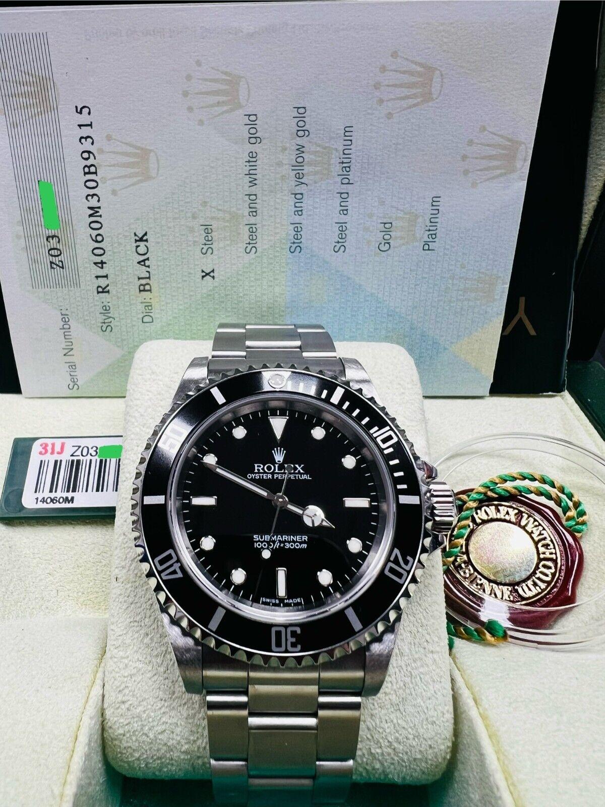 Rolex 14060 Submariner Black Dial Stainless Steel 2006 Box Paper In Excellent Condition For Sale In San Diego, CA