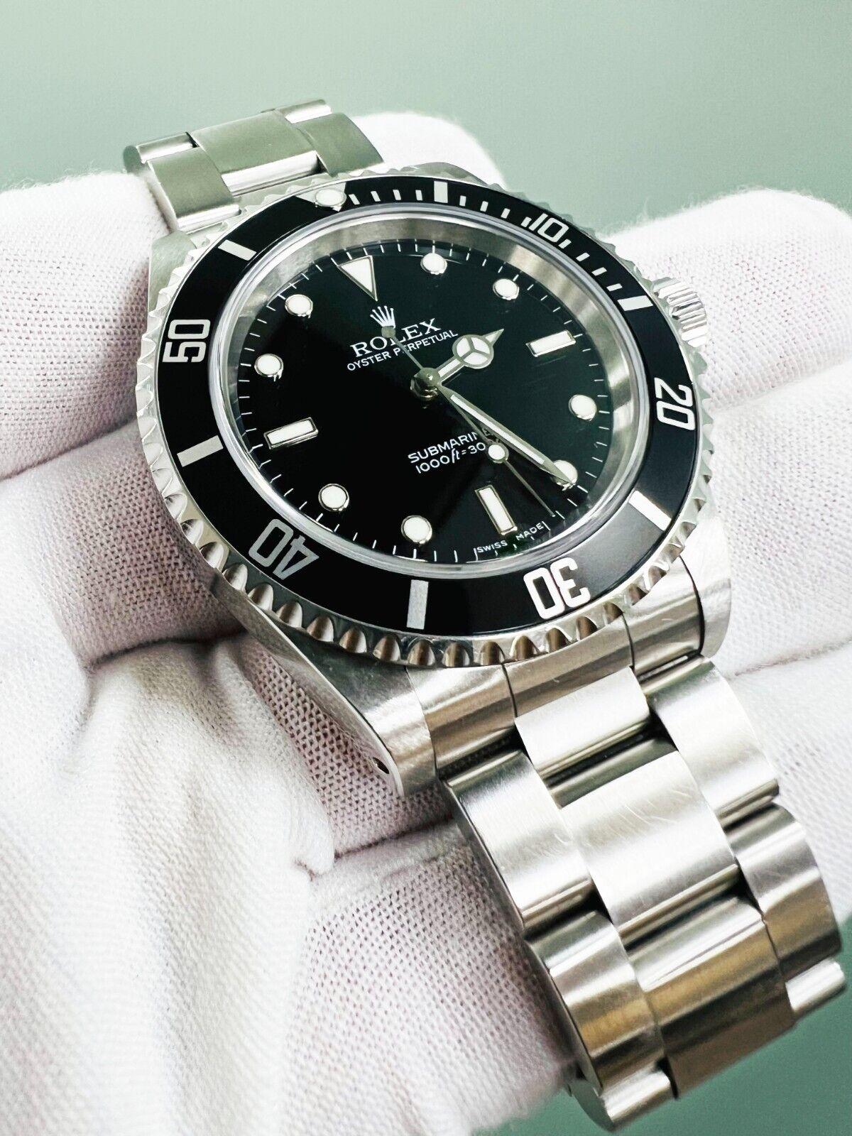 Rolex 14060 Submariner Black Dial Stainless Steel 2006 Box Paper In Excellent Condition In San Diego, CA