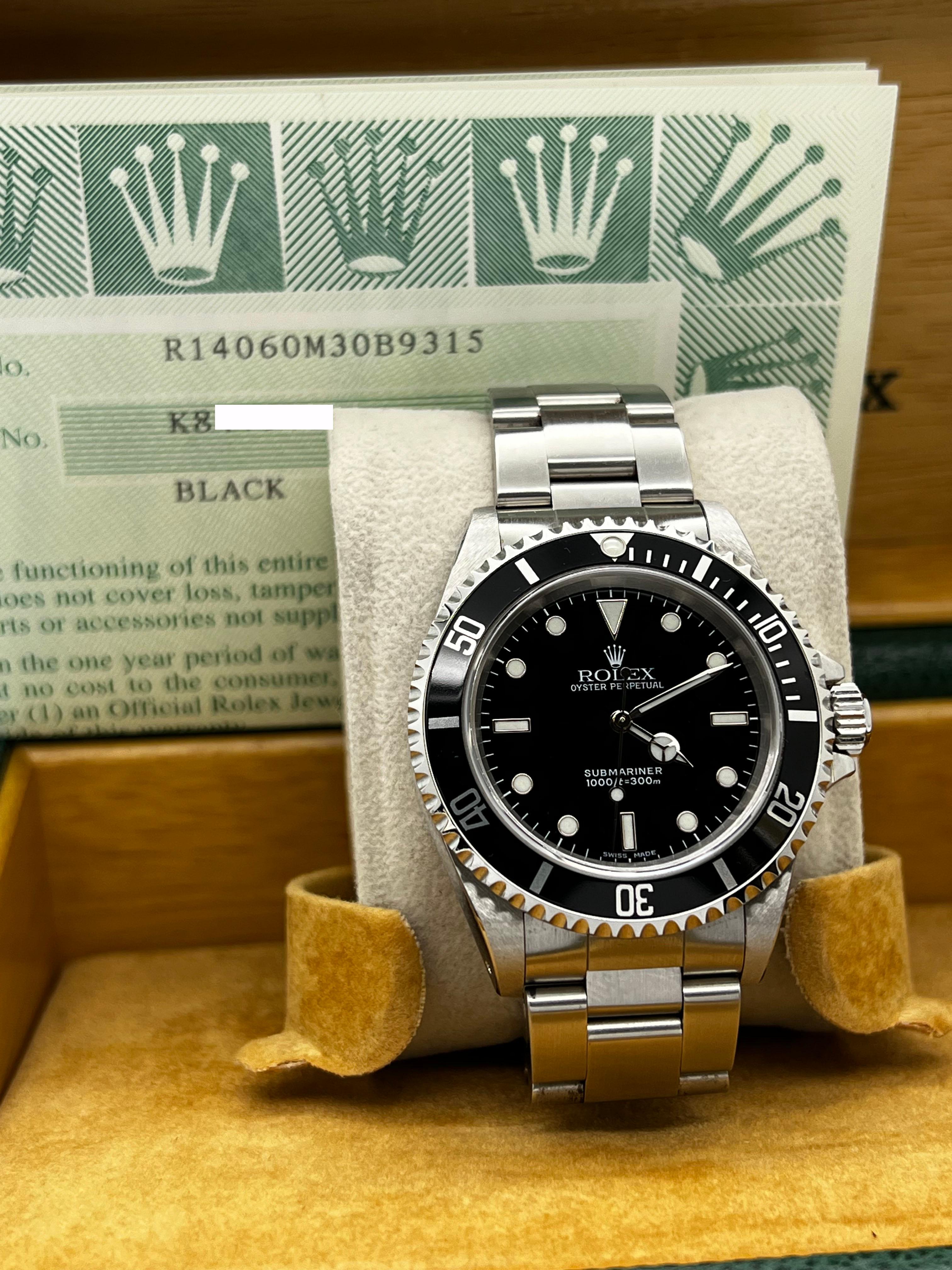 Style Number: 14060



Serial: K847***



Year: 2002

 

Model: Submariner 

 

Case Material: Stainless Steel 

 

Band: Stainless Steel 

 

Bezel: Black 

 

Dial: Black

 

Face: Sapphire Crystal 

 

Case Size: 40mm 

 

Includes: 

-Rolex Box