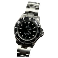 Rolex 14060 Submariner Black Dial Stainless Steel Box Paper 2002