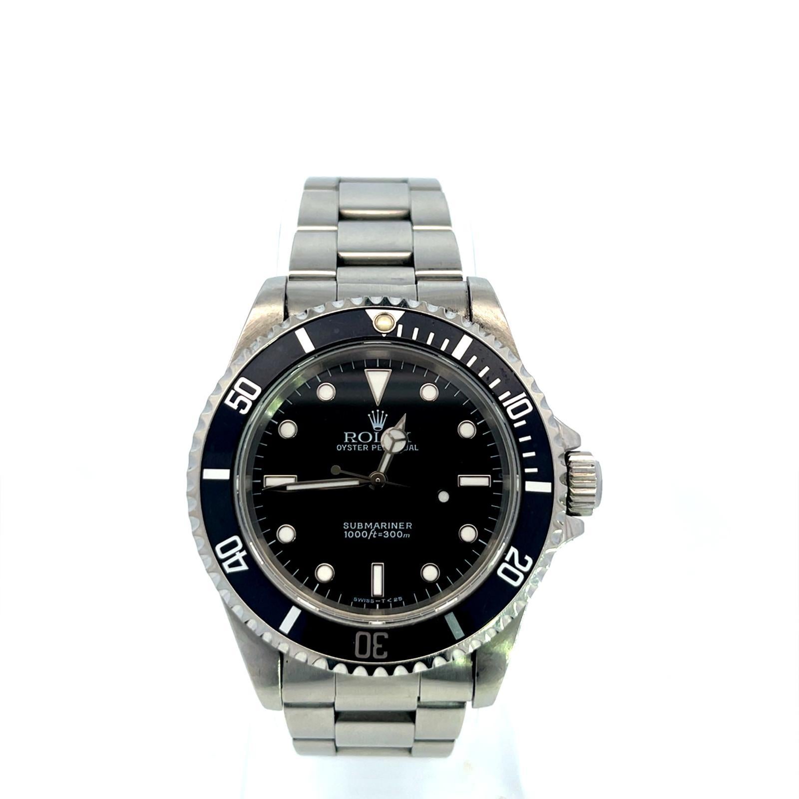 Rolex Modell #: 14060 
Jahr ca. 1996 Submariner Uhr Edelstahl Zifferblatt: Schwarz w / Luminous Indexe, Chromalight Zeiger & Chromalight lume Mit Papieren. Großartig für Sammler!