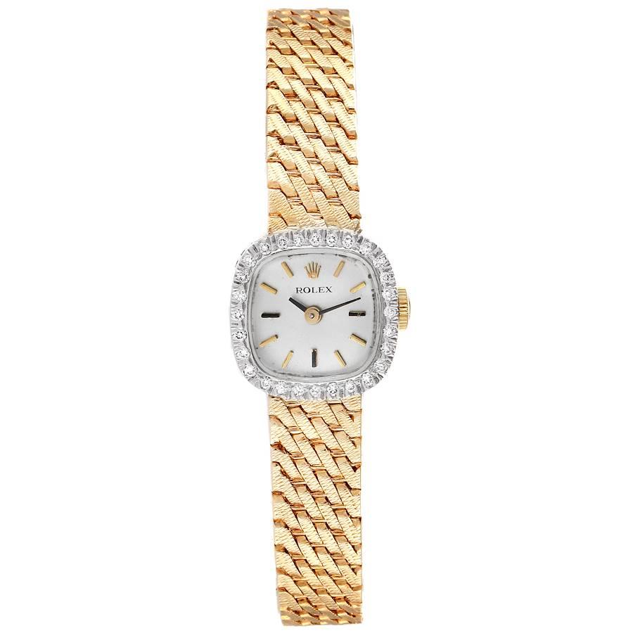Rolex 14k Yellow Gold Diamond Bezel Vintage Cocktail Ladies Watch. Manual winding movement. 14k yellow gold cushion case 17 X 17 mm. Rolex logo on a crown. Original Rolex factory diamond bezel. Scratch resistant sapphire crystal. Flat profile.