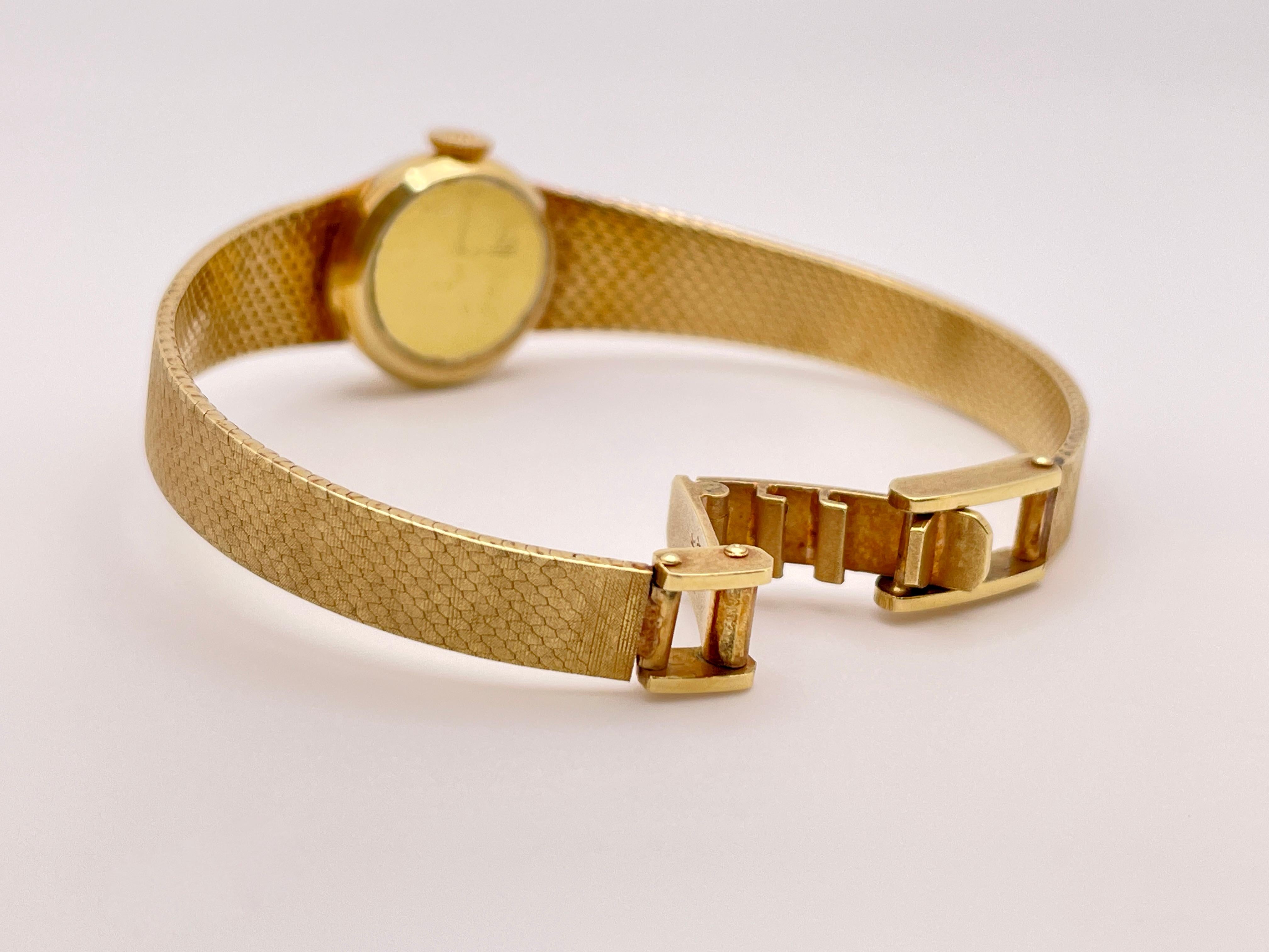 Rolex Montre à remontage pour femme en or jaune 14 carats en vente 8