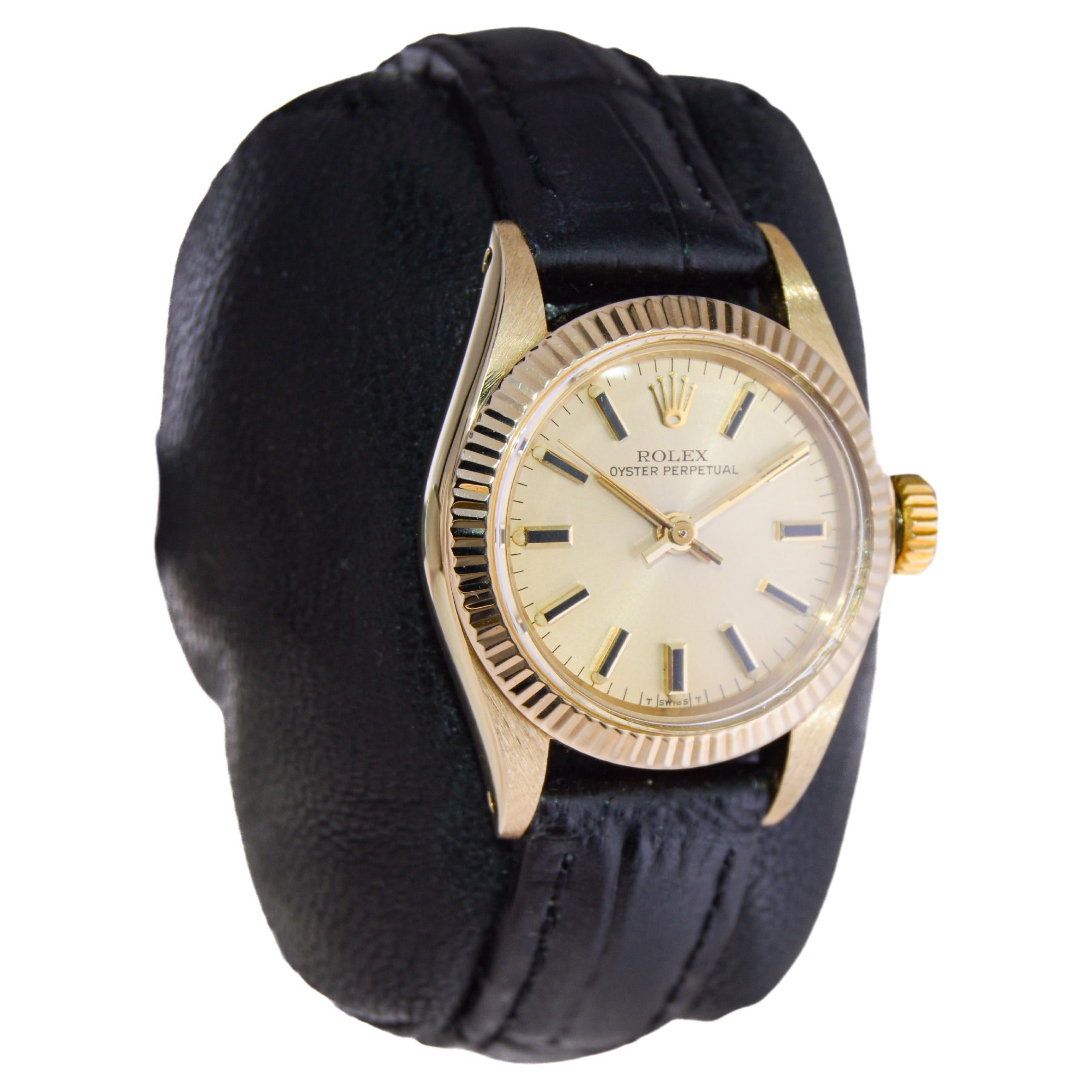 FACTORY / HOUSE: Rolex Watch Company
STYLE / REFERENCE: Oyster Perpetual / Reference 6719
METAL / MATERIAL: 14Kt Solid Gold
CIRCA / YEAR: 1981
DIMENSIONS / SIZE: Length 32mm X Diameter 25mm
MOVEMENT / CALIBER: Perpetual Winding / 28 Jewels / Caliber