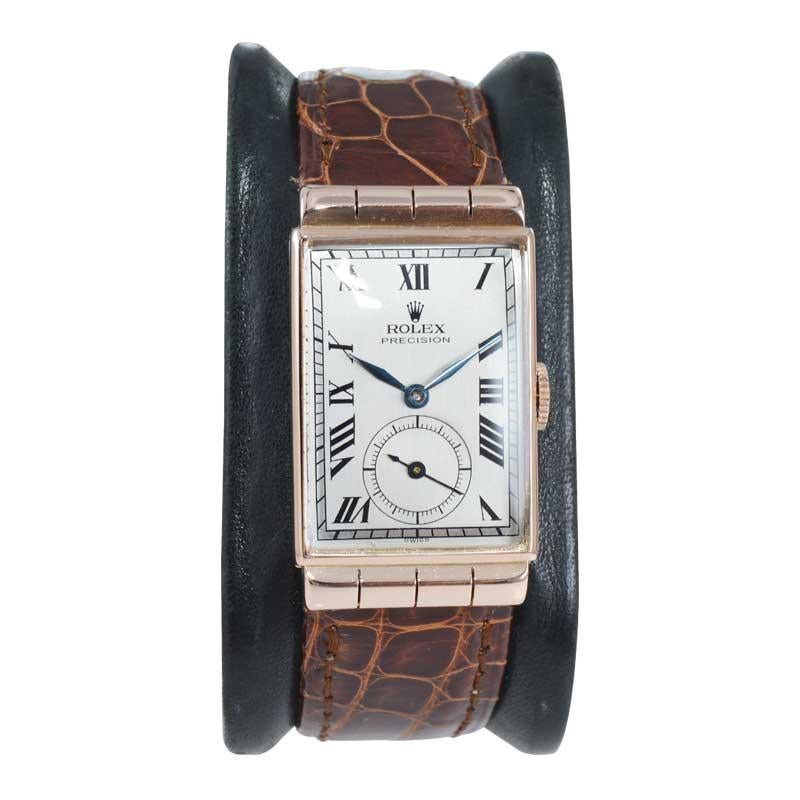 FACTORY / HOUSE: Rolex Watch Company
STYLE / REFERENCE: Art Deco / Reference 3140
METAL / MATERIAL: 14Kt. Solid Rose Gold
CIRCA / YEAR: 1939-40
DIMENSIONS / SIZE: 38mm x 22mm
MOVEMENT / CALIBER: Manual Winding / 17 Jewels / Caliber H.W.
DIAL /