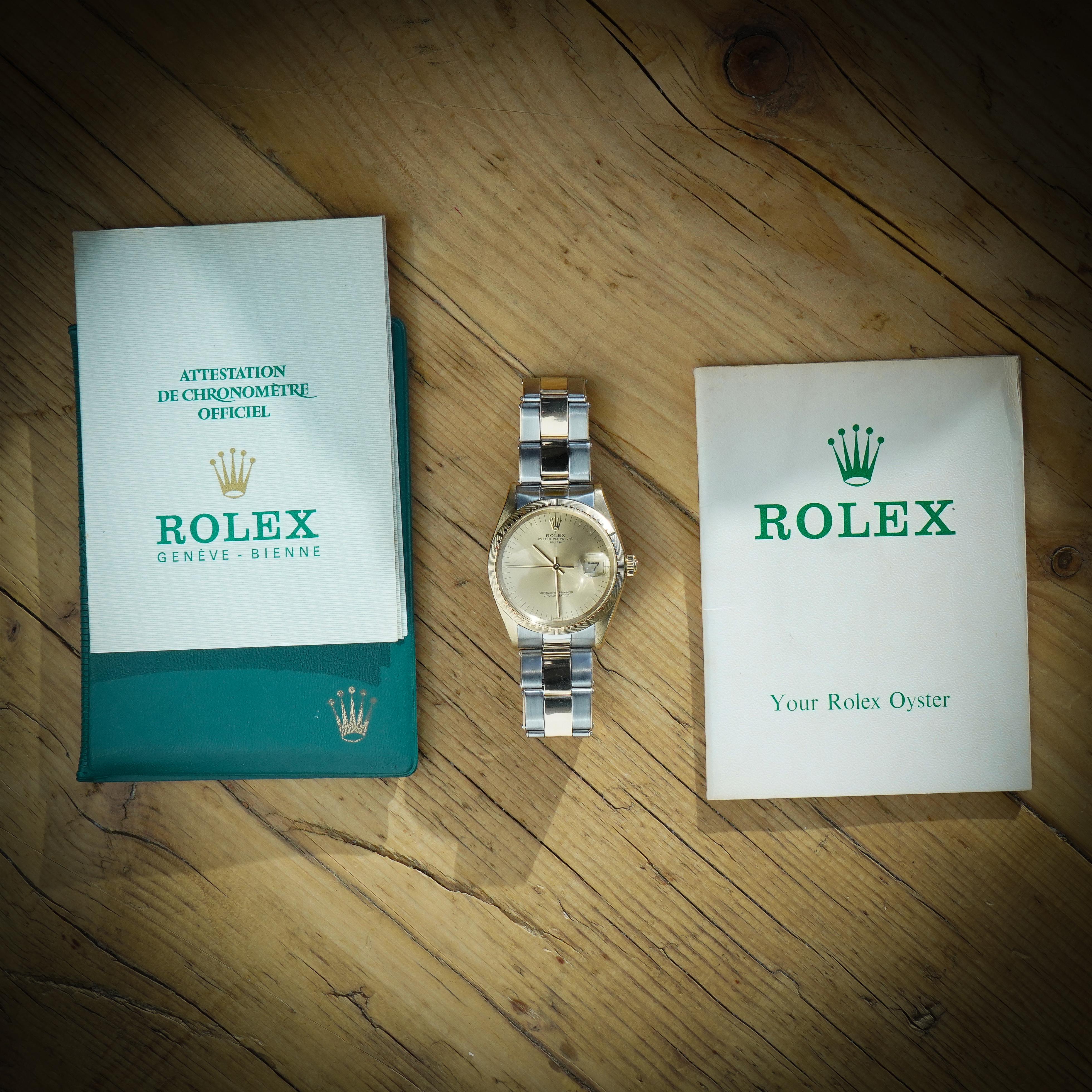 Rolex 14kt. yellow gold and steel Oyster Perpetual Date 1512 
Signed Rolex, Oyster Perpetual Date
Made in Switzerland, Date of purchase, 1990. 

Case Diameter: 34 mm
Crown: Original Rolex 
Dial: signed
Dial: Champagne 
Movement: Automatic Rolex