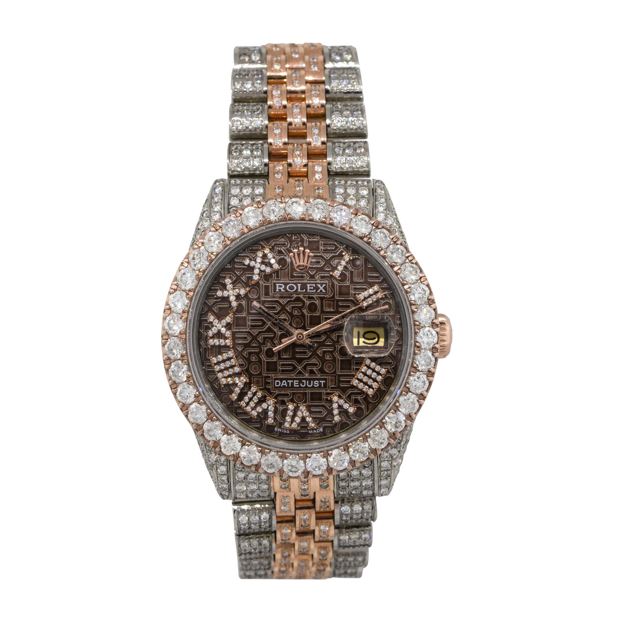 Brand: Rolex
MPN: 1601
Model: Datejust
Case Material: Stainless steel with aftermarket Diamonds
Case Diameter: 36mm
Crystal: Sapphire Crystal
Bezel: 18k Rose Gold fluted bezel with aftermarket Diamonds
Dial: Chocolate dial with rose gold hands and