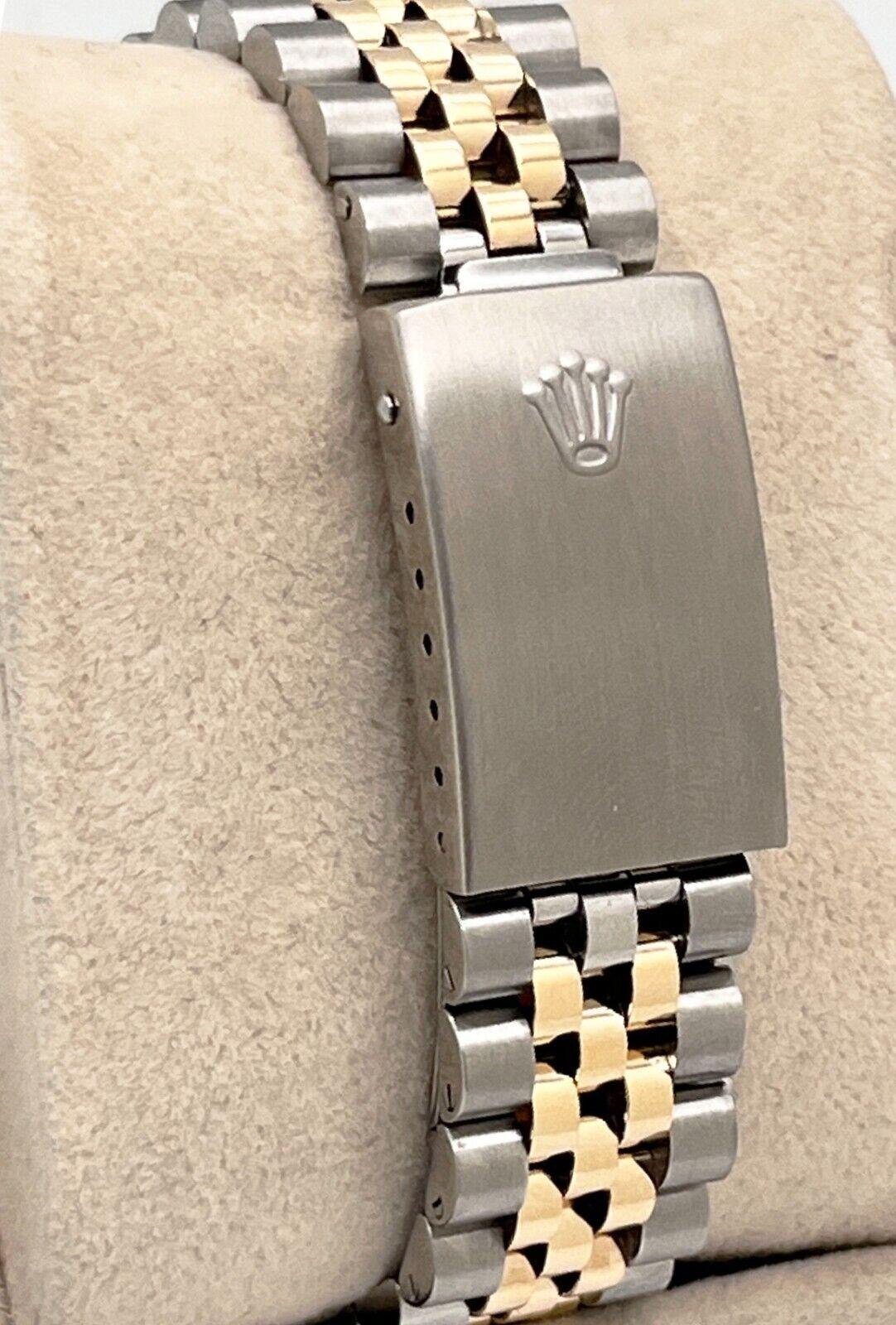 Style Number: 16013
Serial: 6493***
Year: 1980
Model: Datejust
Case Material: Stainless Steel
Band: Custom 18K Yellow Gold & Stainless Steel Band
Bezel: 18K Yellow Gold
Dial: Champagne
Face: Acrylic 
Case Size: 36mm

Includes: 
-Elegant Watch