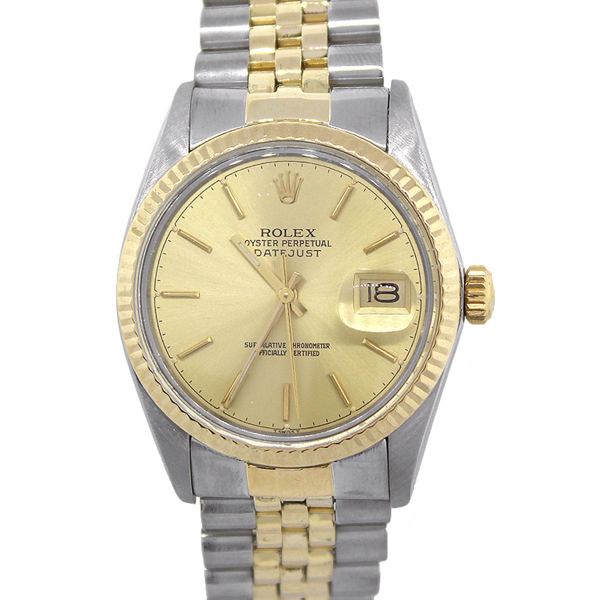 Brand: Rolex
MPN: 16013
Model: Datejust
Case Material: Stainless steel
Case Diameter: 36mm
Crystal: Plastic
Bezel: 18k yellow gold fluted bezel
Dial: Champagne Dial with yellow gold sticks and hands. Date can be found at 3 O’clock
Bracelet: 18k