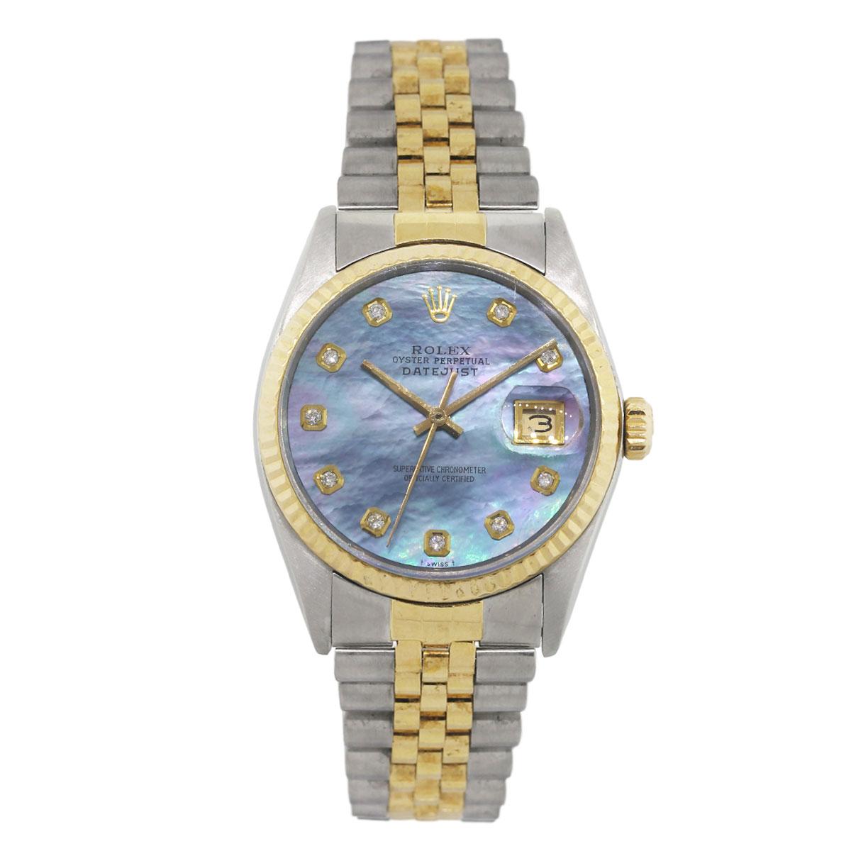 Brand: Rolex
MPN: 16013
Model: Datejust
Case Material: Stainless steel
Case Diameter: 36mm
Crystal: Sapphire crystal
Bezel: 18k yellow gold bezel
Dial: Tahitian mother of pearl diamond dial (aftermarket)
Bracelet: 18k yellow gold and stainless steel