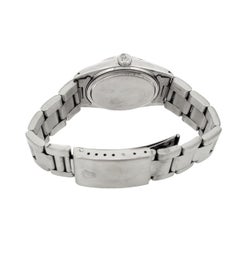 Rolex 16014 Date just Stainless Steel avec lunette cannelée en or blanc.  Circa 1978