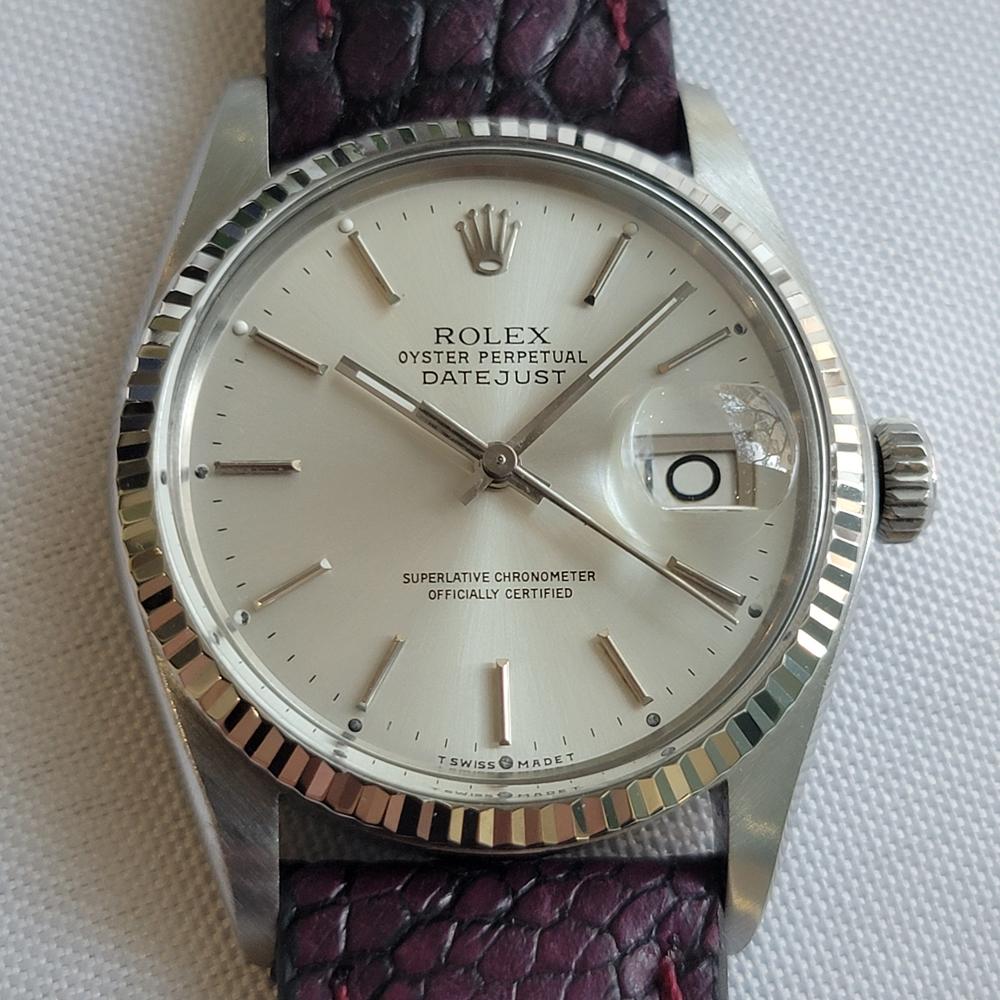 Timeless classic, Men's 18k white gold and stainless steel Rolex Oyster Perpetual Datejust Ref.16014 automatic, c.1977, in excellent working condition. Verified authentic by a master watchmaker. Gorgeous Rolex signed silver dial, applied baton index