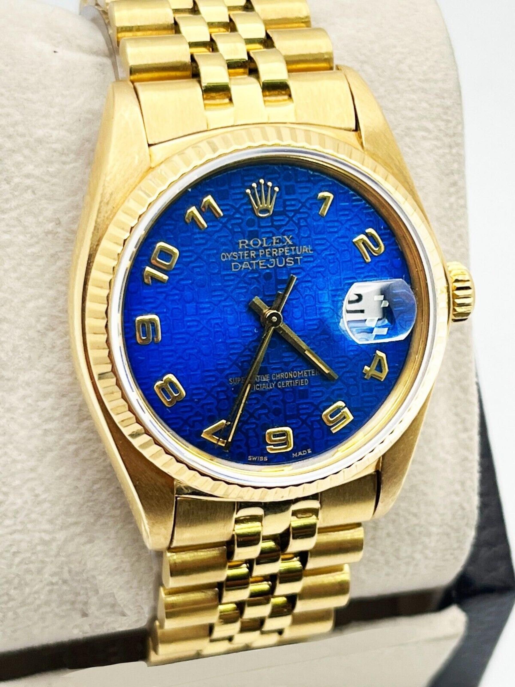 Style Number: 16018



Serial: 5633***



Year: 1978

 

Model: Datejust 

 

Case Material: 18K Yellow Gold

 

Band: 18K Yellow Gold

 

Bezel: 18K Yellow Gold 

 

Dial: Factory Blue Jubilee Dial 

 

Face: Sapphire Crystal 

 

Case Size: 36mm