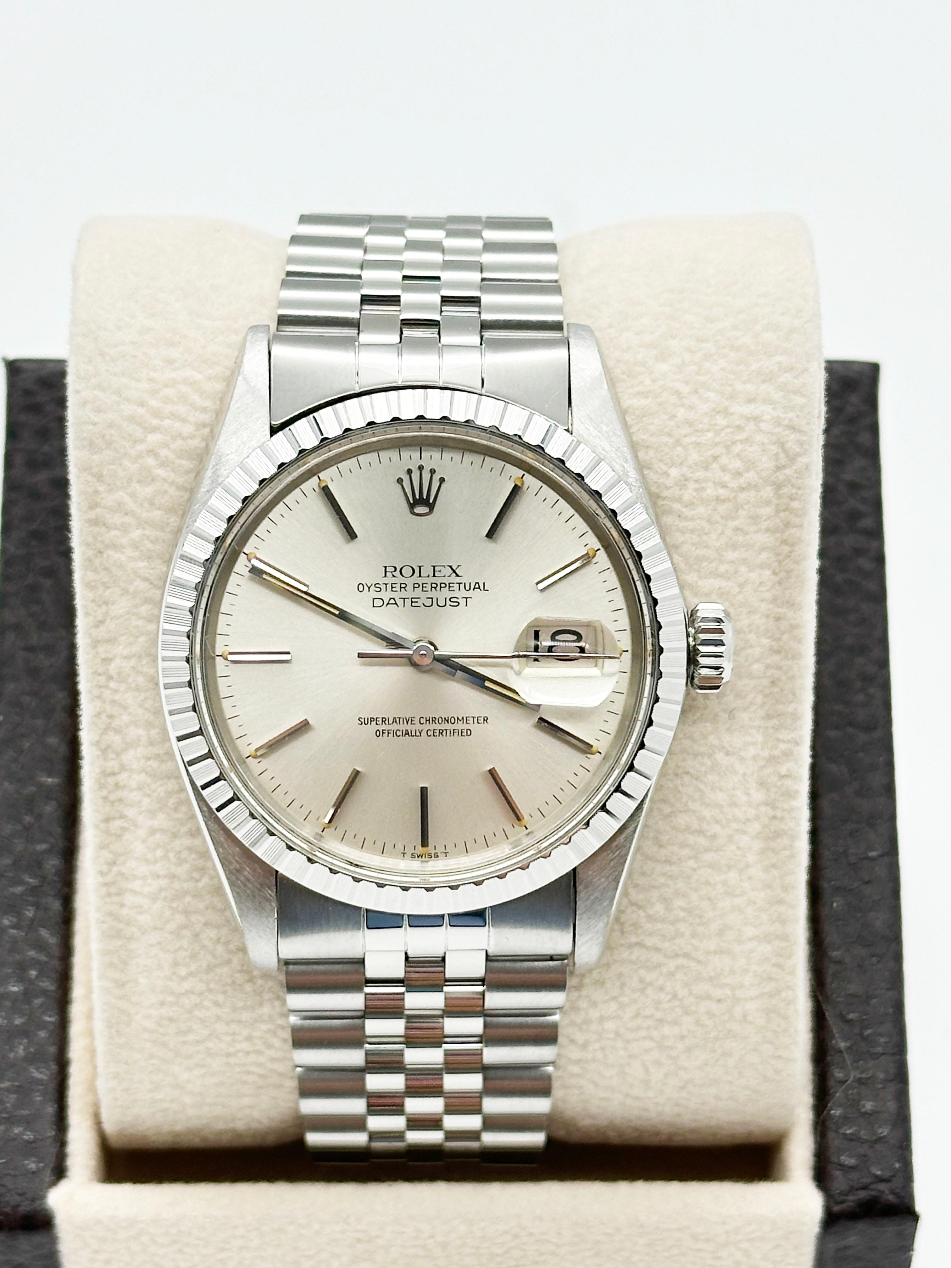 Style Number: 16030
Serial: 6541***
Year: 1981
Model: Datejust
Case Material: Stainless Steel
Band: Stainless Steel
Bezel: Stainless Steel
Dial: Silver
Face: Sapphire Crystal
Case Size: 36mm 

Includes: 
-Elegant Watch Box
-Certified Appraisal 
-1