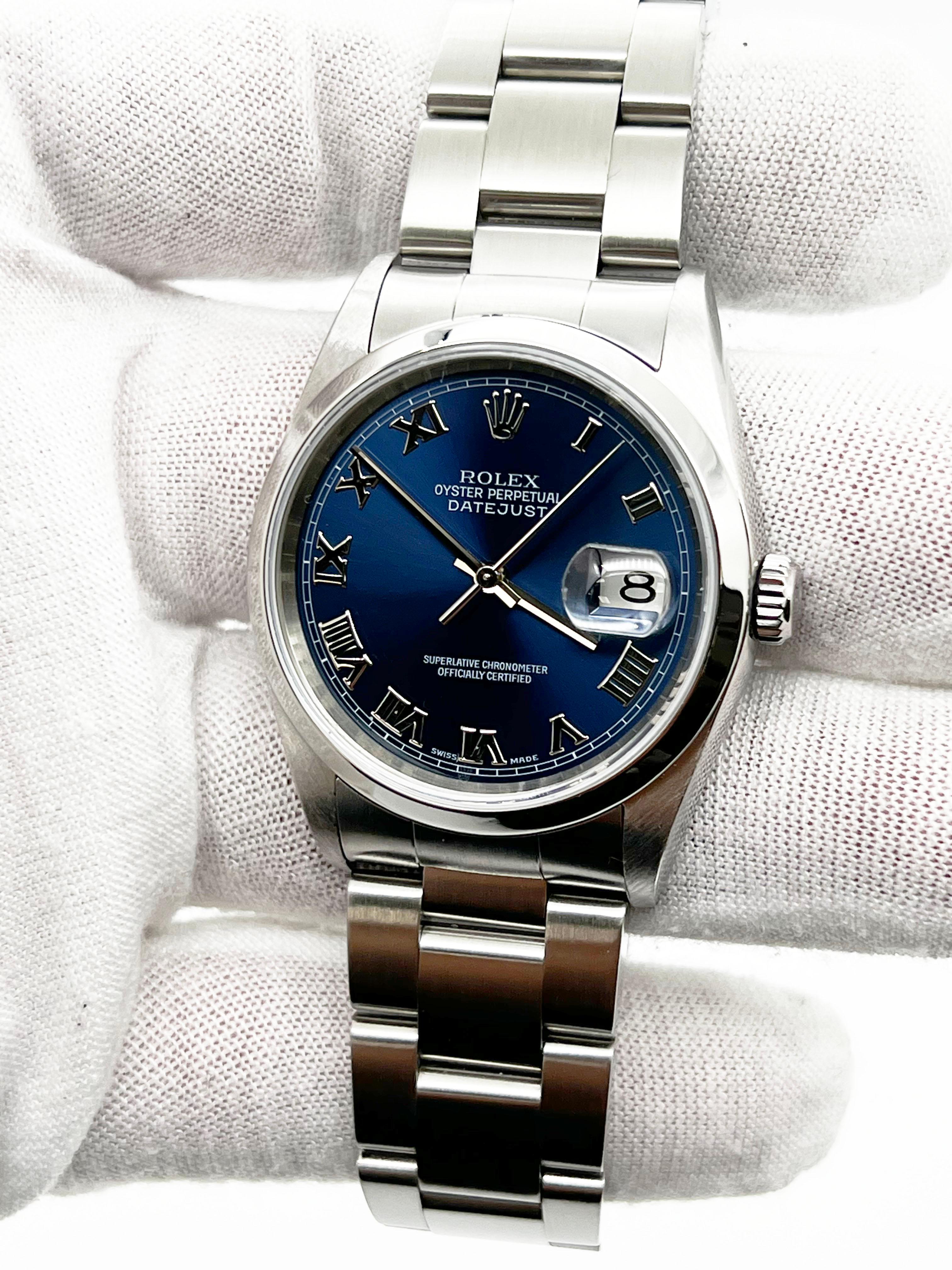Rolex 16200 Datejust Blaues römisches Zifferblatt Edelstahl Box Papier 2004 für Damen oder Herren