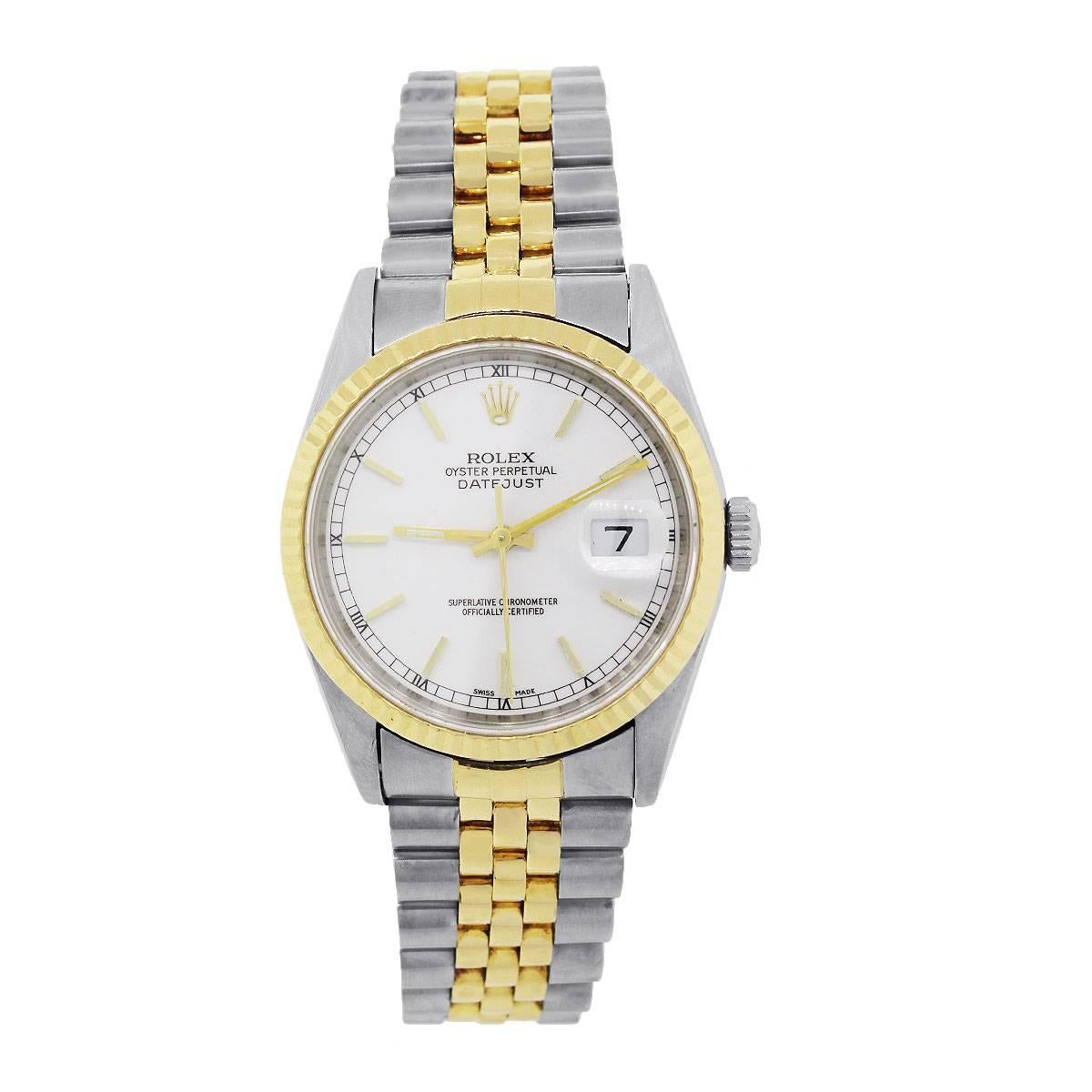Brand: Rolex
MPN: 16233
Model: Datejust
Case Material: Stainless Steel and 18k Yellow Gold
Case Diameter: 36mm
Crystal: Scratch resistant sapphire
Bezel: 18k Yellow Gold fluted bezel (factory)
Dial: White dial with gold stick dial markers ; Date at