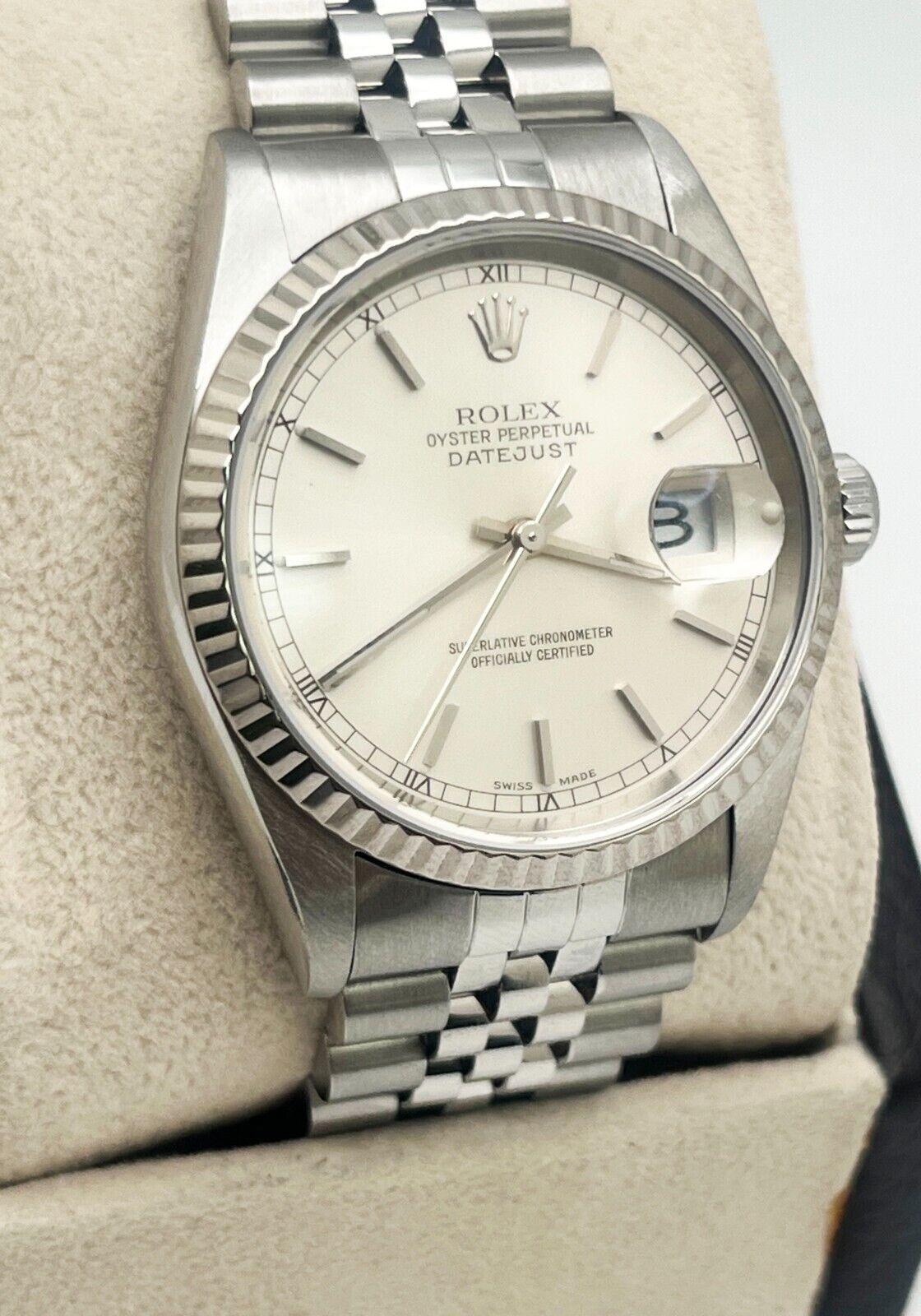 Style Number: 16234

Serial: A835***

Year: 2000
 
Model: Datejust
 
Case Material: Stainless Steel
 
Band: Stainless Steel
  
Bezel: 18K White Gold
 
Dial: Silver
 
Face: Sapphire Crystal
 
Case Size: 36mm
 
Includes: 
-Rolex Box &