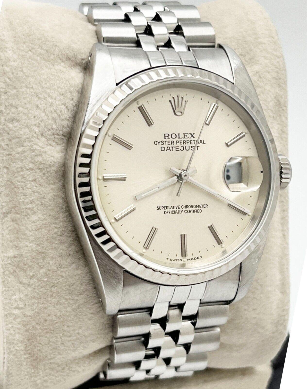 Style Number: 16234

Serial: R555***

Year: 1987

Model: Datejust

Case Material: Stainless Steel

Band: Stainless Steel

Bezel: 18K White Gold 

Dial: Silver

Face: Sapphire Crystal

Case Size: 36mm

Includes: 

-Elegant Watch Box

-Certified