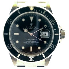 Rolex 16610 Submariner Uhr mit schwarzem Zifferblatt und schwarzer Lünette